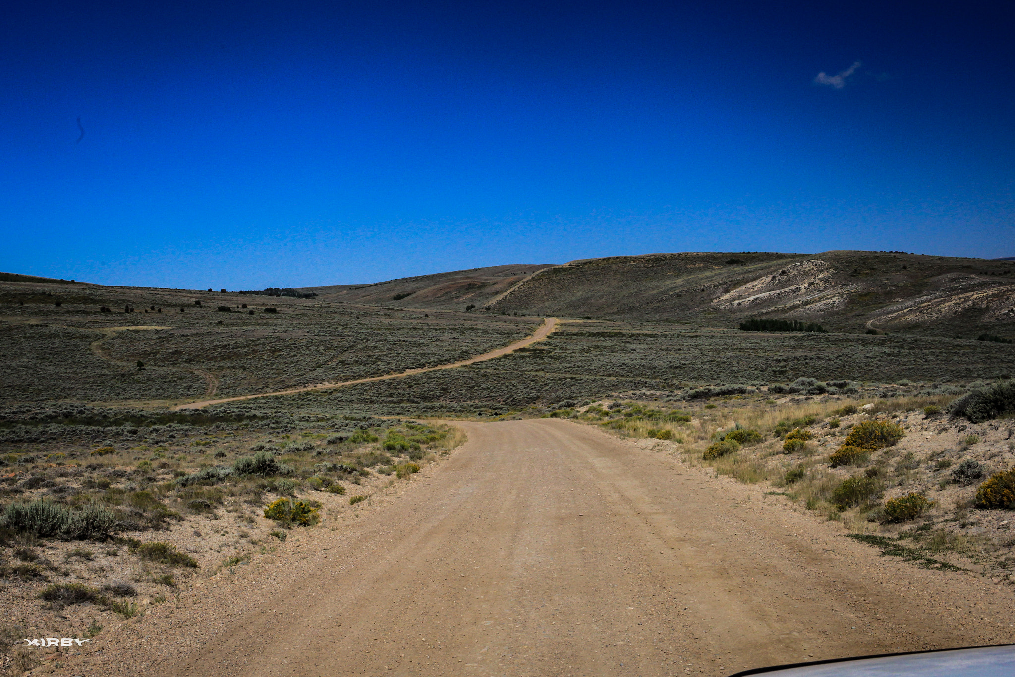 Canon EF 24-70mm F4L IS USM sample photo. Dusty roads photography