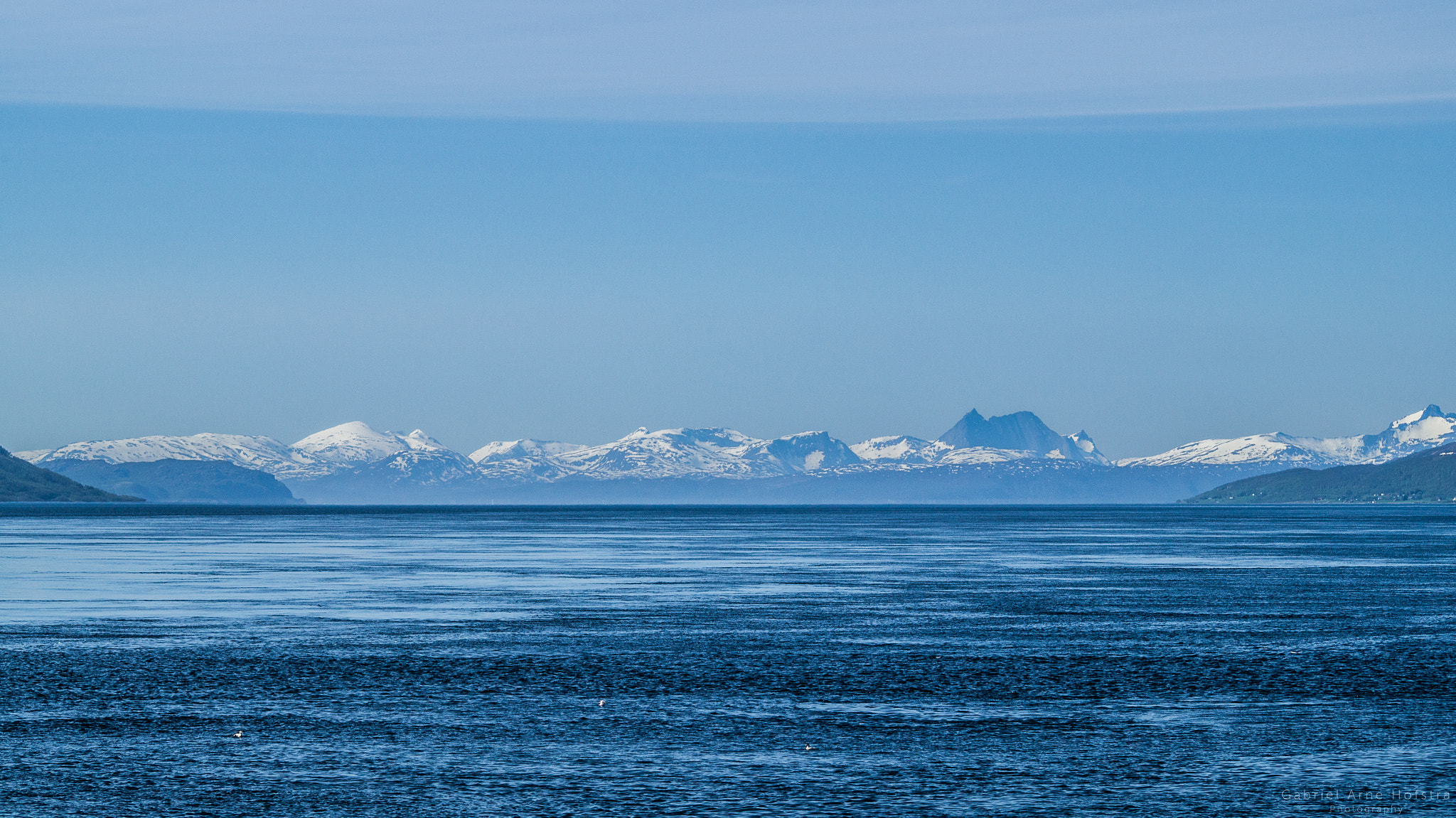 Sigma 70-300mm F4-5.6 DL Macro sample photo. Ocean, mountains, sky photography