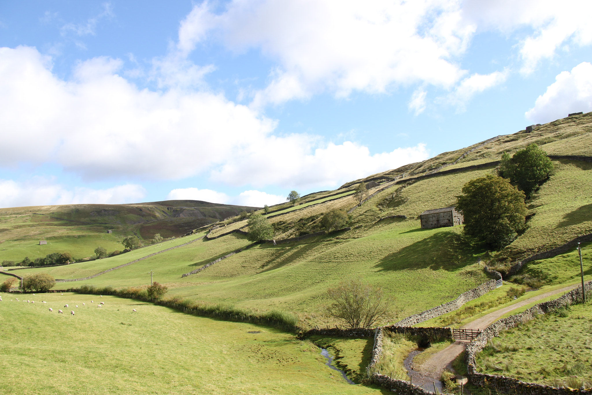 Canon EF-S 18-200mm F3.5-5.6 IS sample photo. House on hillside photography