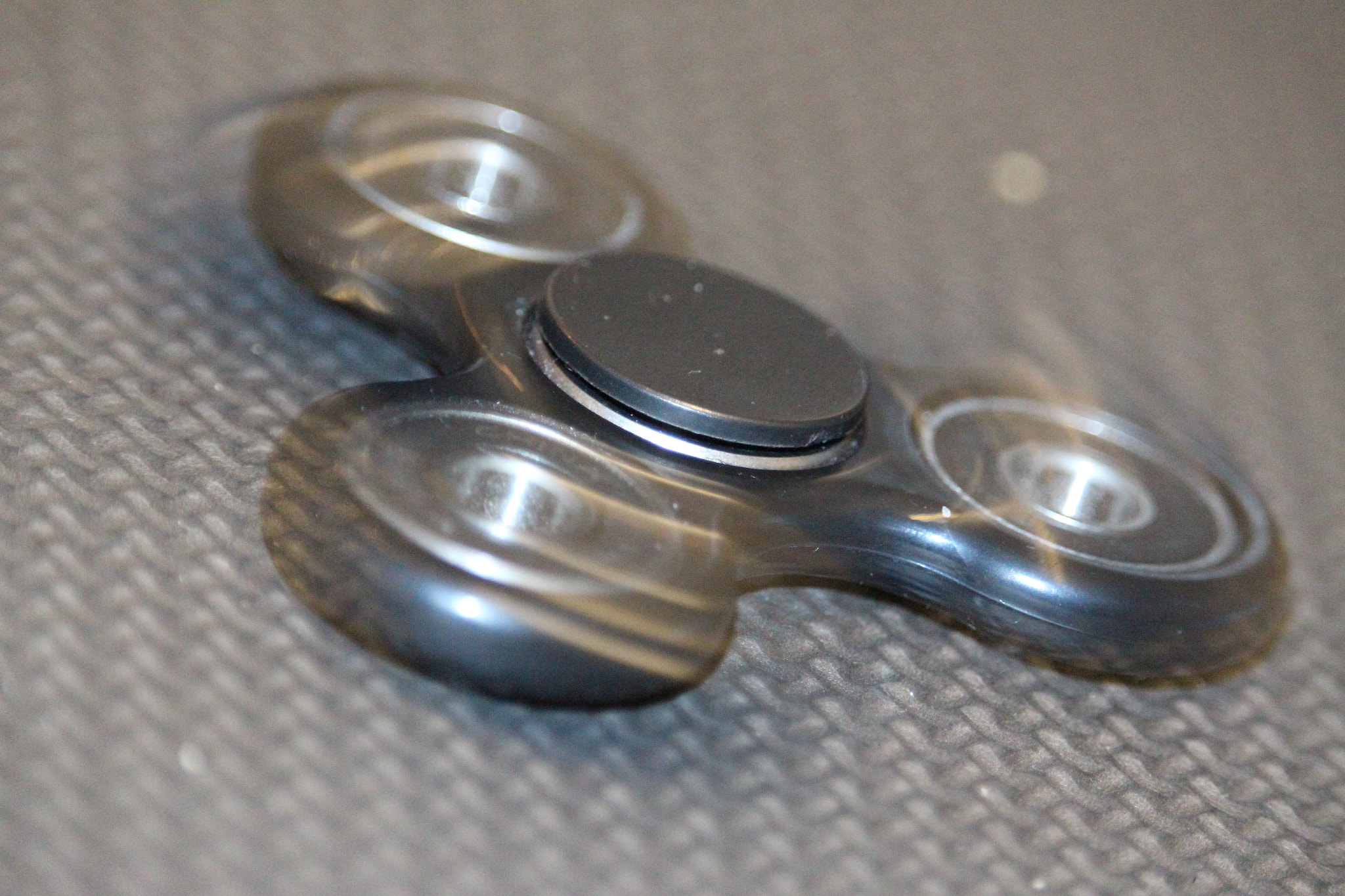 Canon EF-S 55-250mm F4-5.6 IS STM sample photo. Fidget spinner toy photography