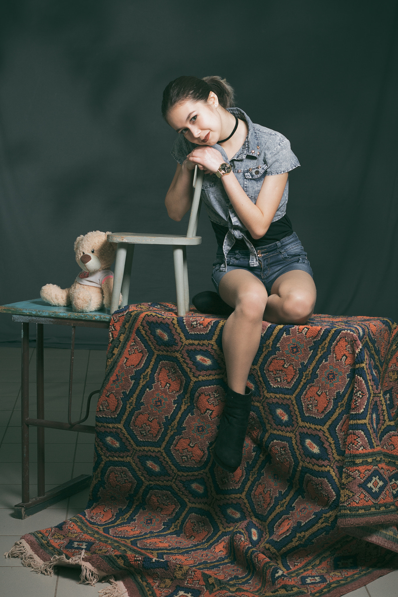 Canon EF 50mm F2.5 Macro sample photo. Portrait of a beautiful girl on the old carpet. photography