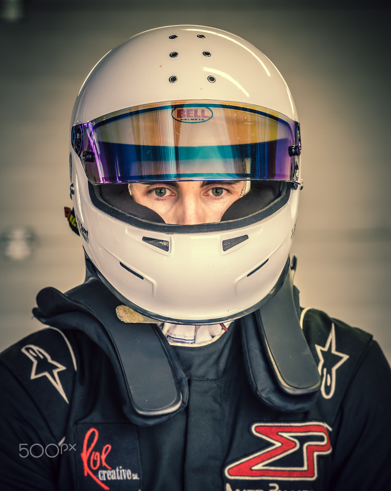 Canon EOS 7D + Canon EF 70-200mm F4L USM sample photo. Focused racing driver photography