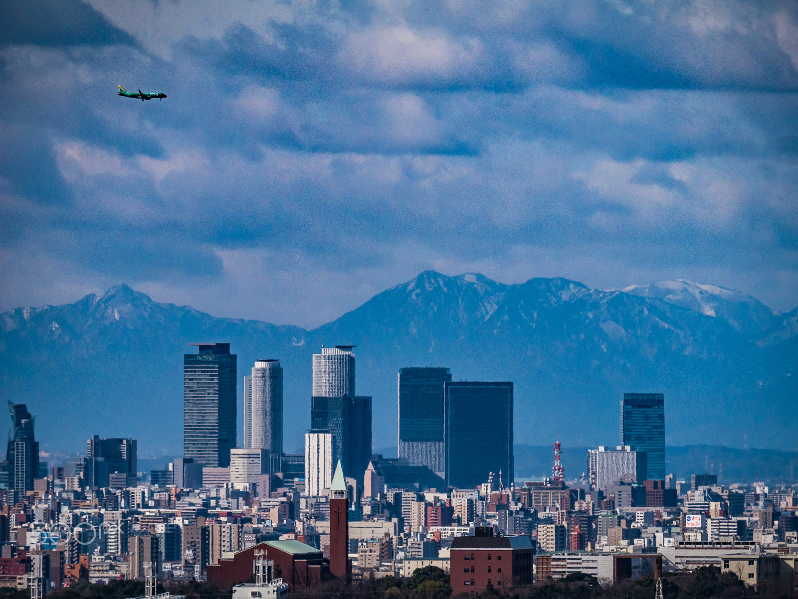 Panasonic Lumix DMC-G7 + LEICA DG 100-400/F4.0-6.3 sample photo. Fuji dream airlines with nagoya station photography