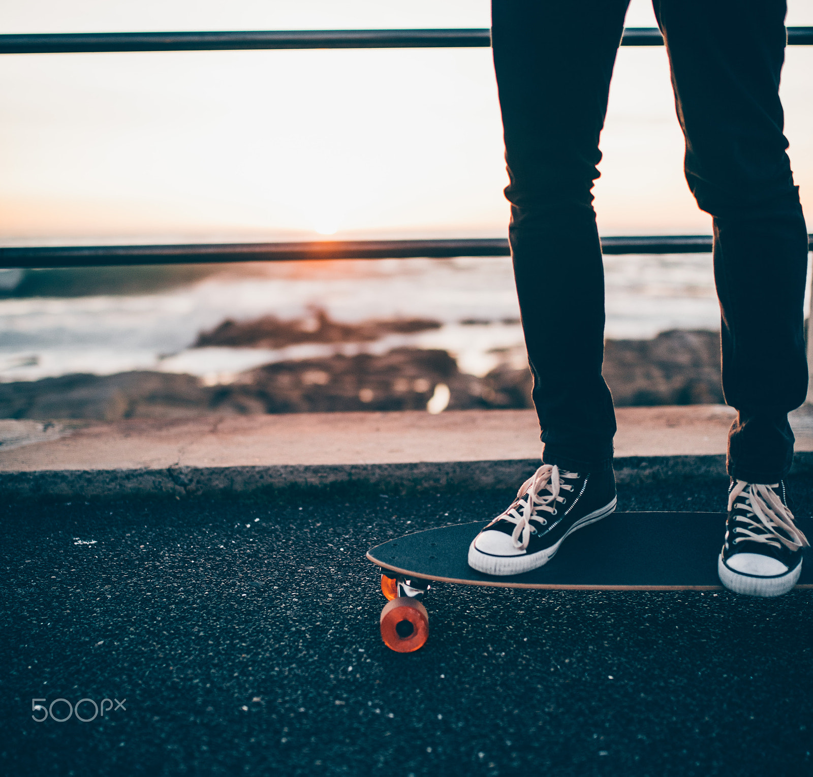 Canon EOS 5DS + Sigma 35mm F1.4 DG HSM Art sample photo. Close-up of man standing on longboard photography