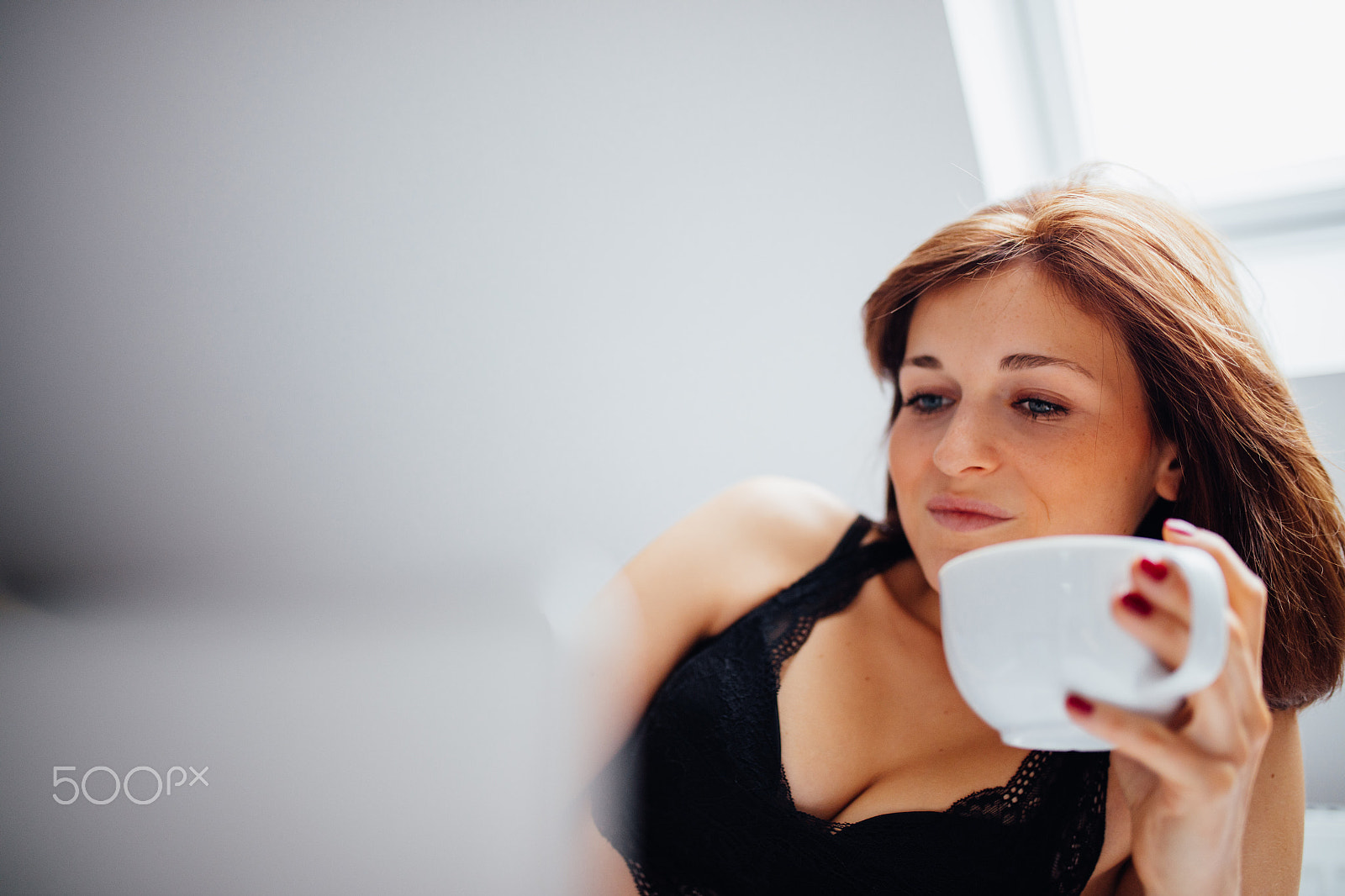 Canon EOS 5DS sample photo. Young caucasian female laying in bed drinking coffee photography