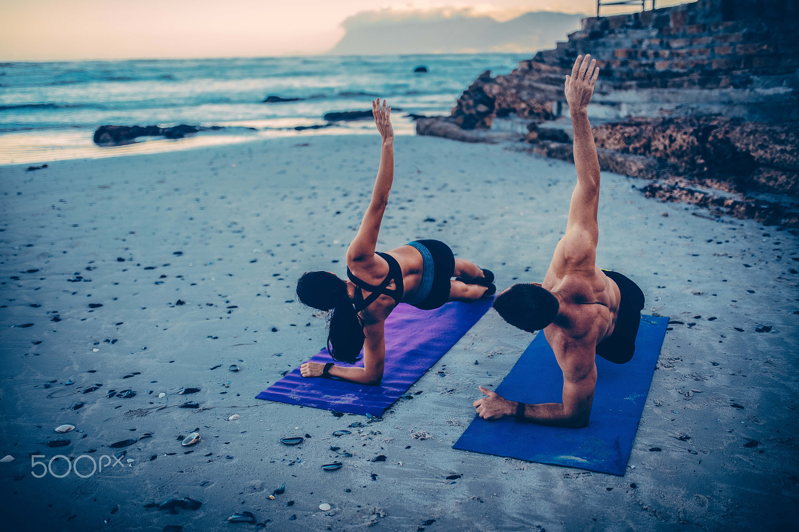 Canon EOS 5DS + Sigma 35mm F1.4 DG HSM Art sample photo. Young adult couple doing fitness exercises on the beach photography
