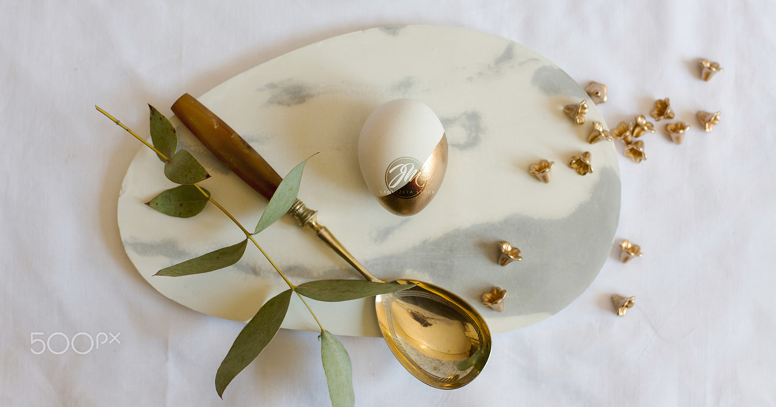 Nikon D7100 sample photo. Easter: place setting, elegant gold and white egg, on marble pla photography