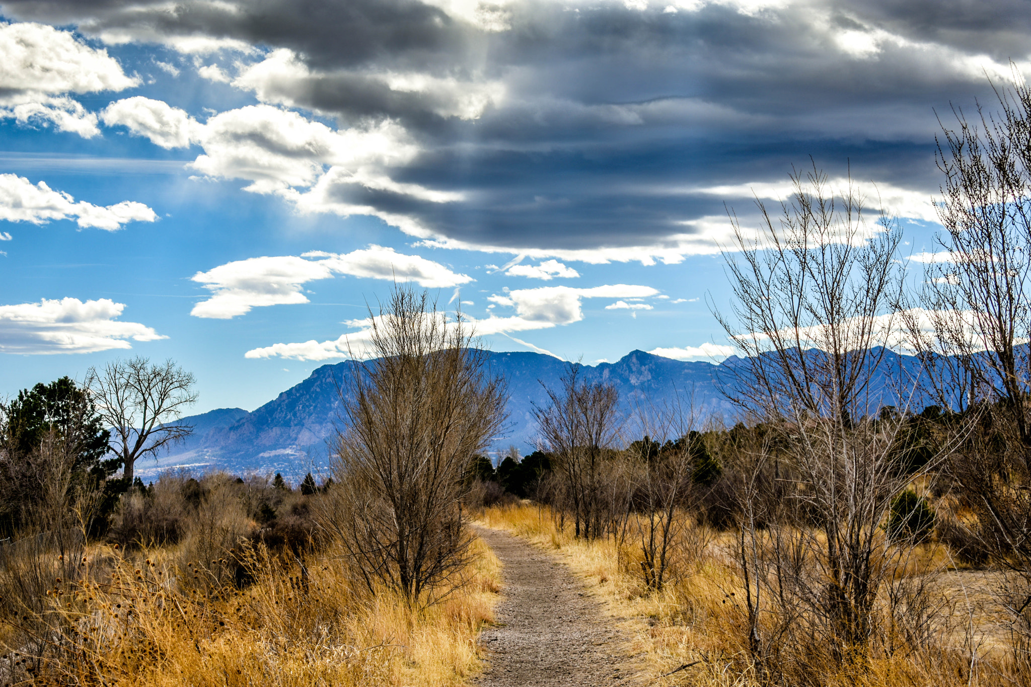 Nikon D3400 sample photo. Clouds rocky mountains photography