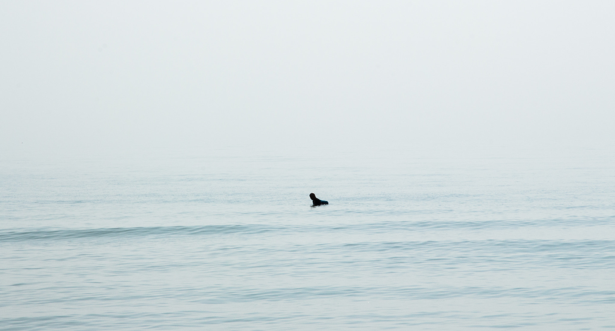 Canon EOS 700D (EOS Rebel T5i / EOS Kiss X7i) + Canon EF-S 15-85mm F3.5-5.6 IS USM sample photo. Surfer, above water. boom! minimalism photography