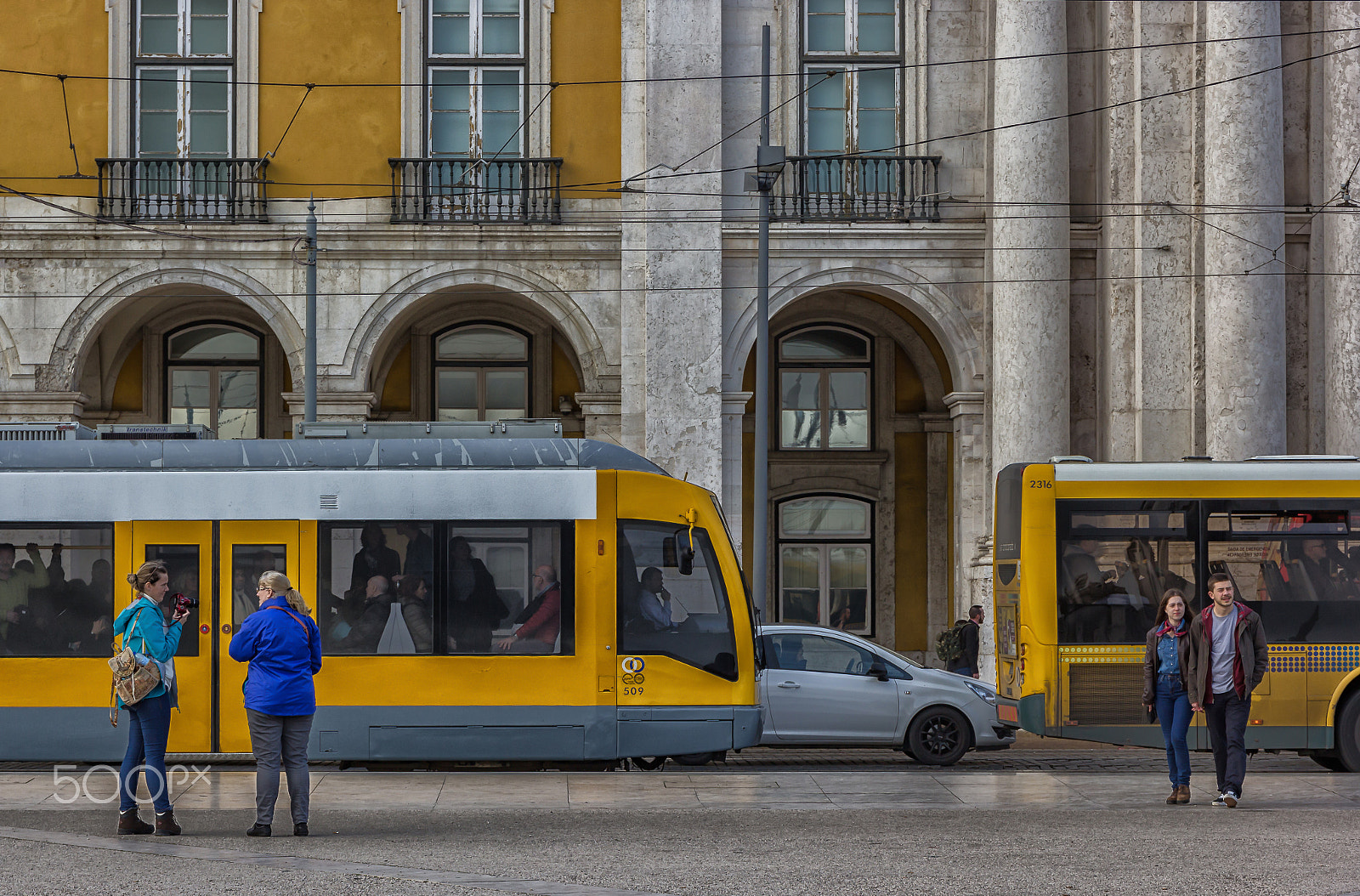 Canon EF 24-70mm F4L IS USM sample photo. Classic building, modern trolley photography
