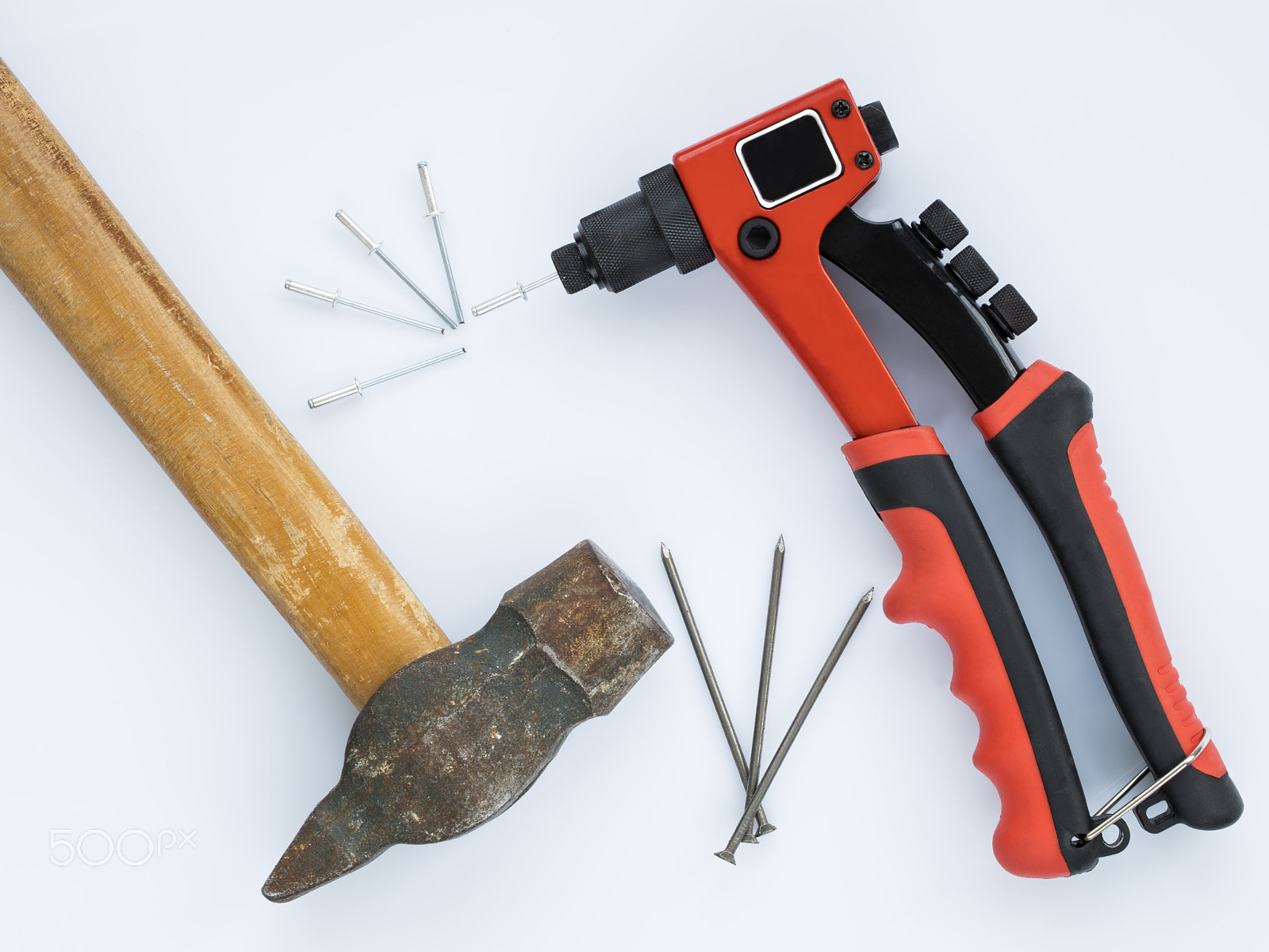 Canon EF 100mm F2.8L Macro IS USM sample photo. Old hammer and nails against new rivet gun and rivets photography