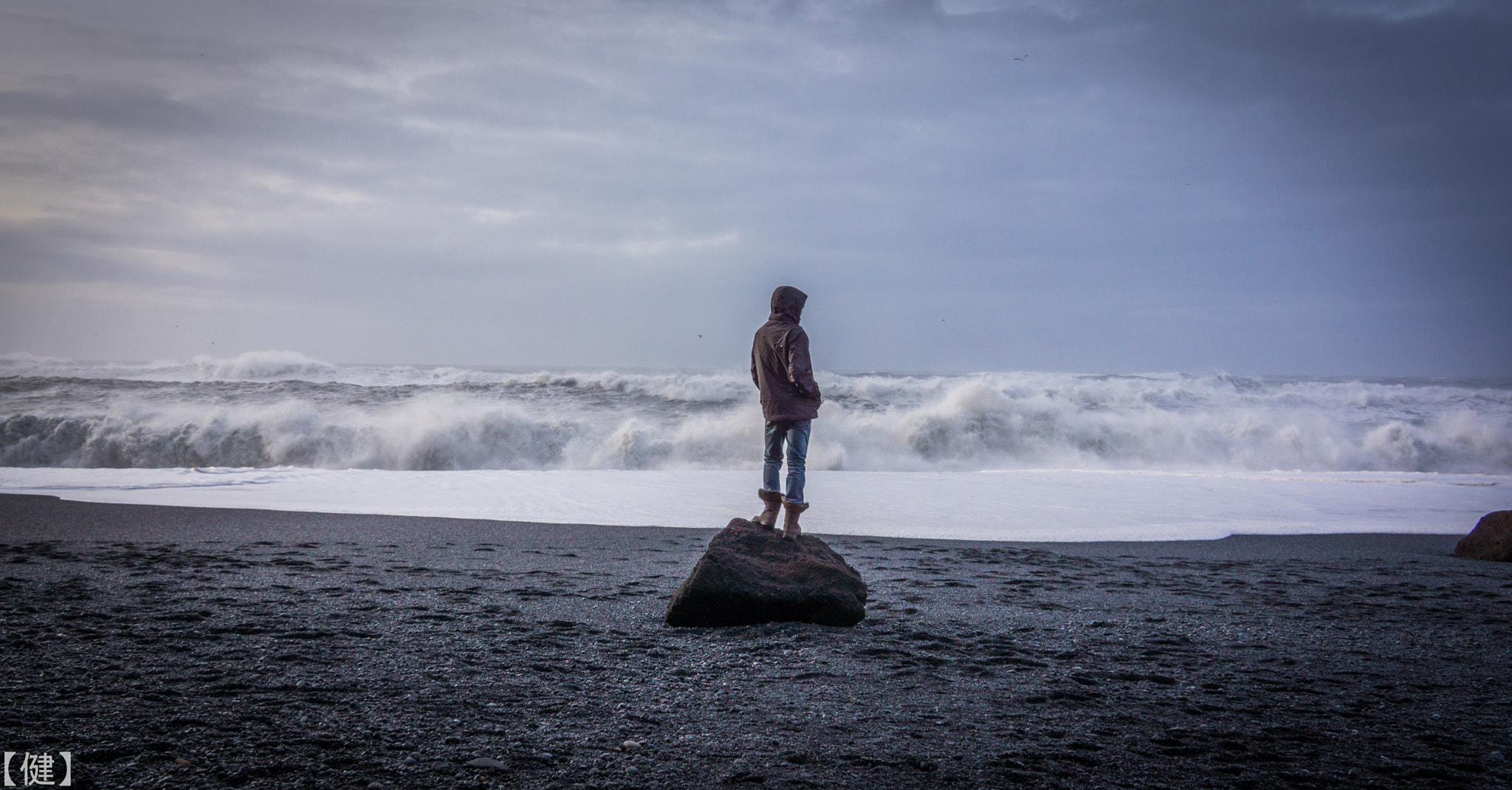 Sony Alpha NEX-7 sample photo. Boy on a rock at black sand beach photography