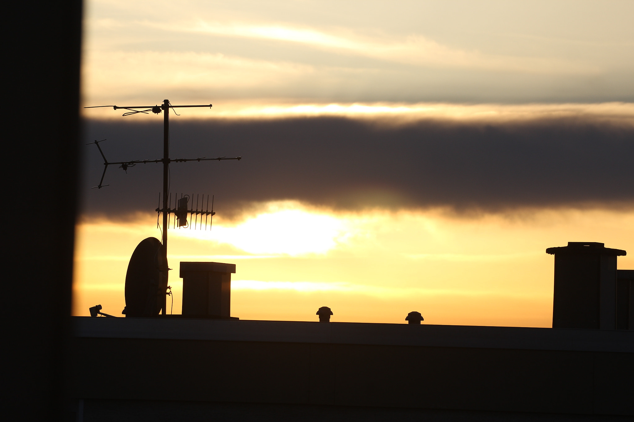 Canon EOS 1200D (EOS Rebel T5 / EOS Kiss X70 / EOS Hi) sample photo. Sunset over the roofs photography