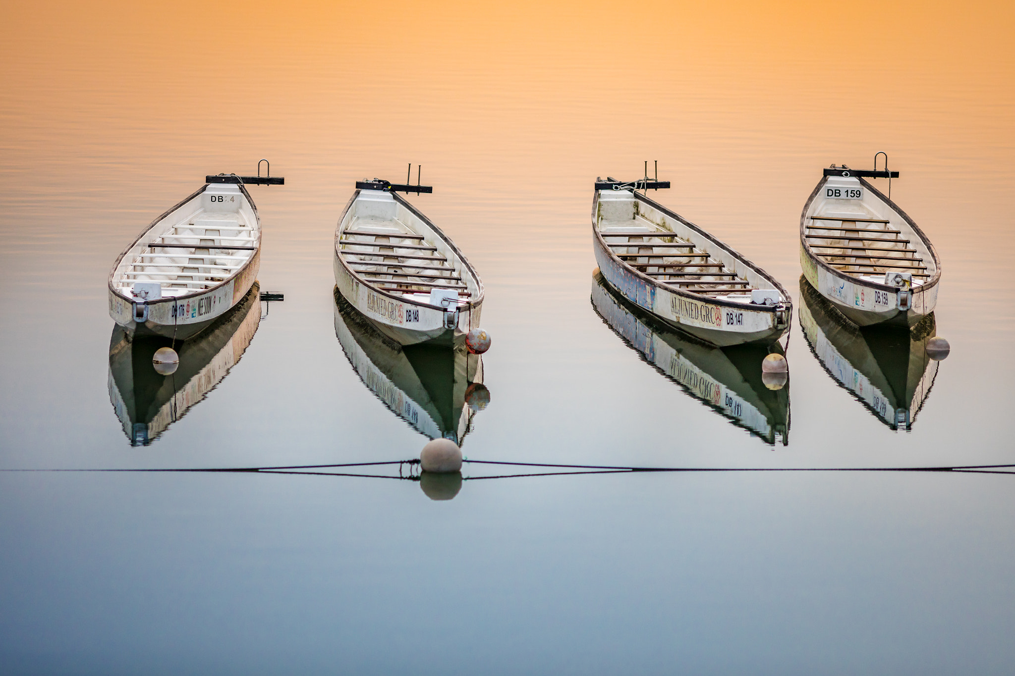 Canon EOS 5D Mark IV + Canon EF 200mm F2.8L II USM sample photo. Boats and reflections photography