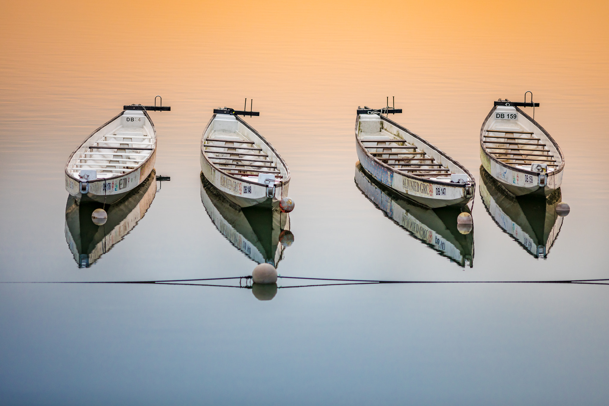 Canon EF 200mm F2.8L II USM sample photo. Boats and reflections photography