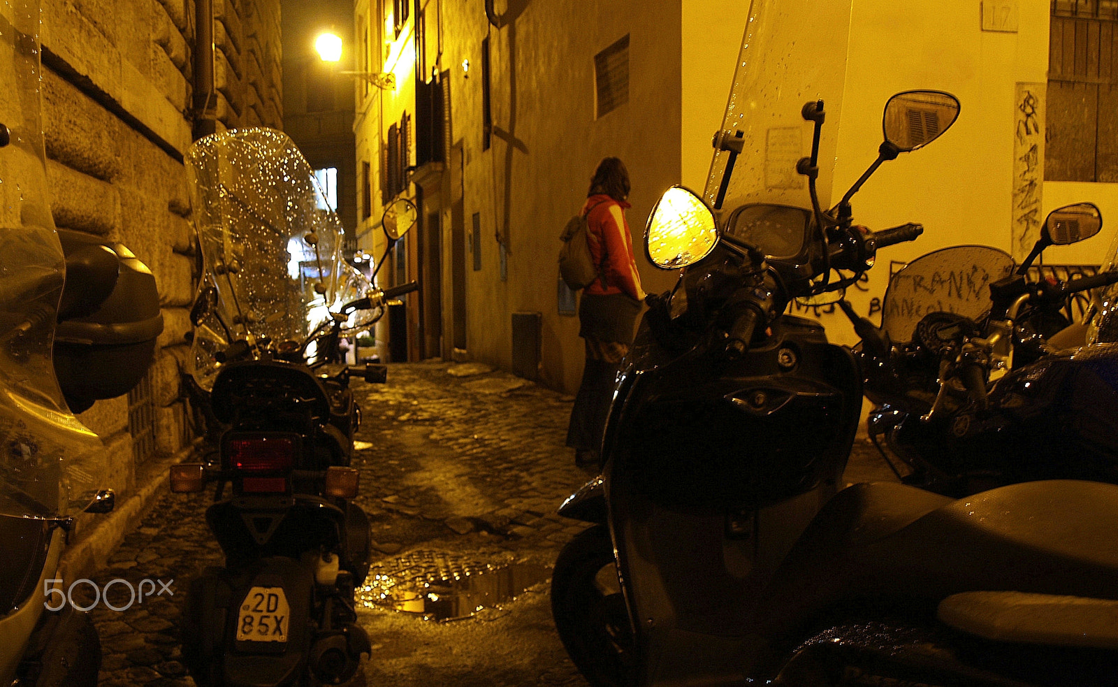 Olympus E-400 (EVOLT E-400) sample photo. Scooters on the streets of rome at night photography