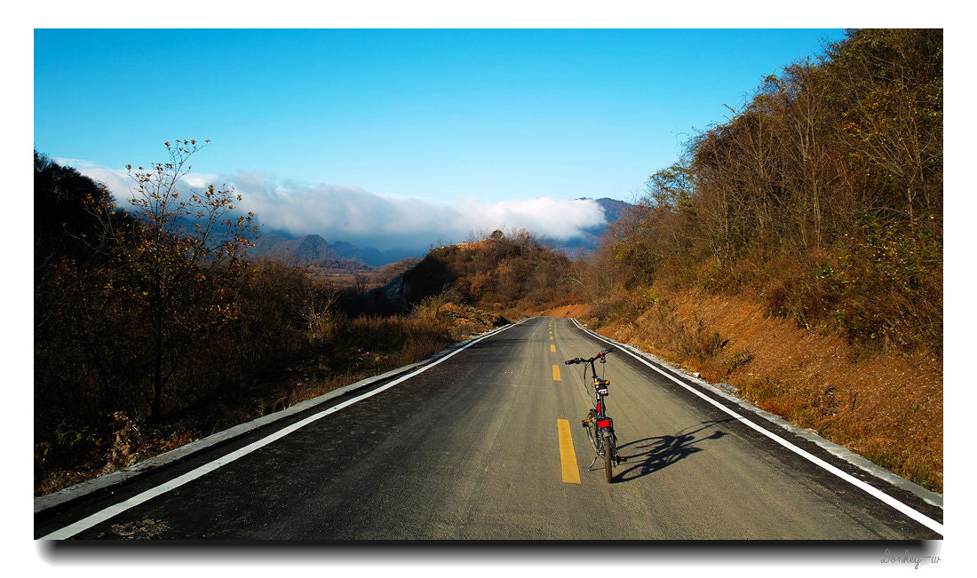 Sigma DP1 sample photo. Cycling in the mountains photography