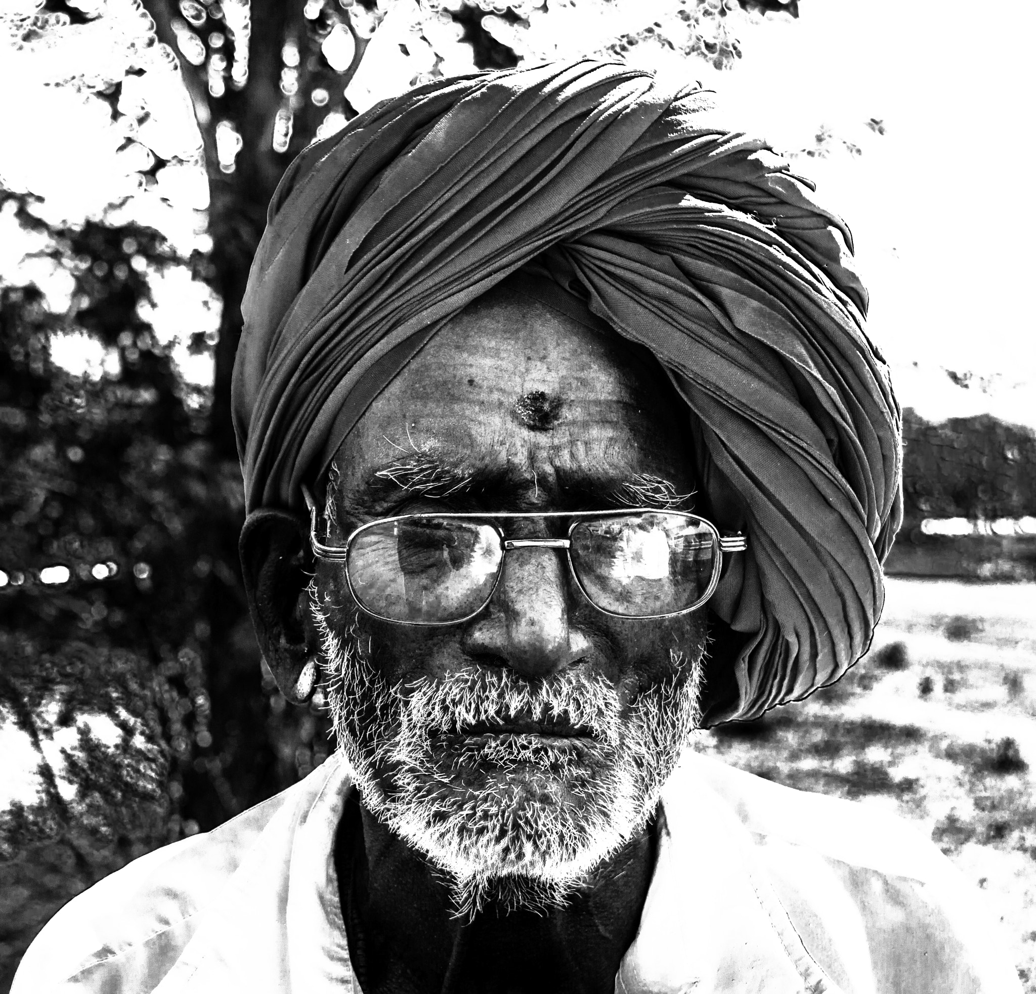 Canon EF-S 18-135mm F3.5-5.6 IS sample photo. The turbaned man photography