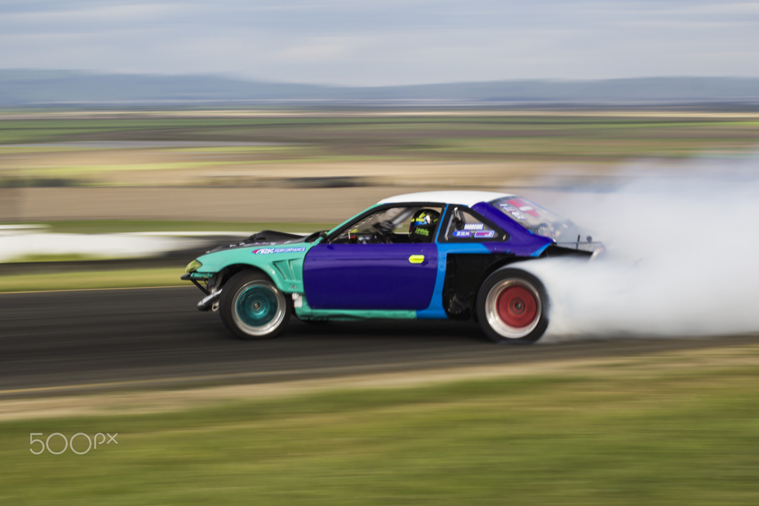 Canon EOS 1200D (EOS Rebel T5 / EOS Kiss X70 / EOS Hi) + Canon EF 50mm F1.2L USM sample photo. Wednesday night drift. sonoma raceway. 3/15/2017 photography