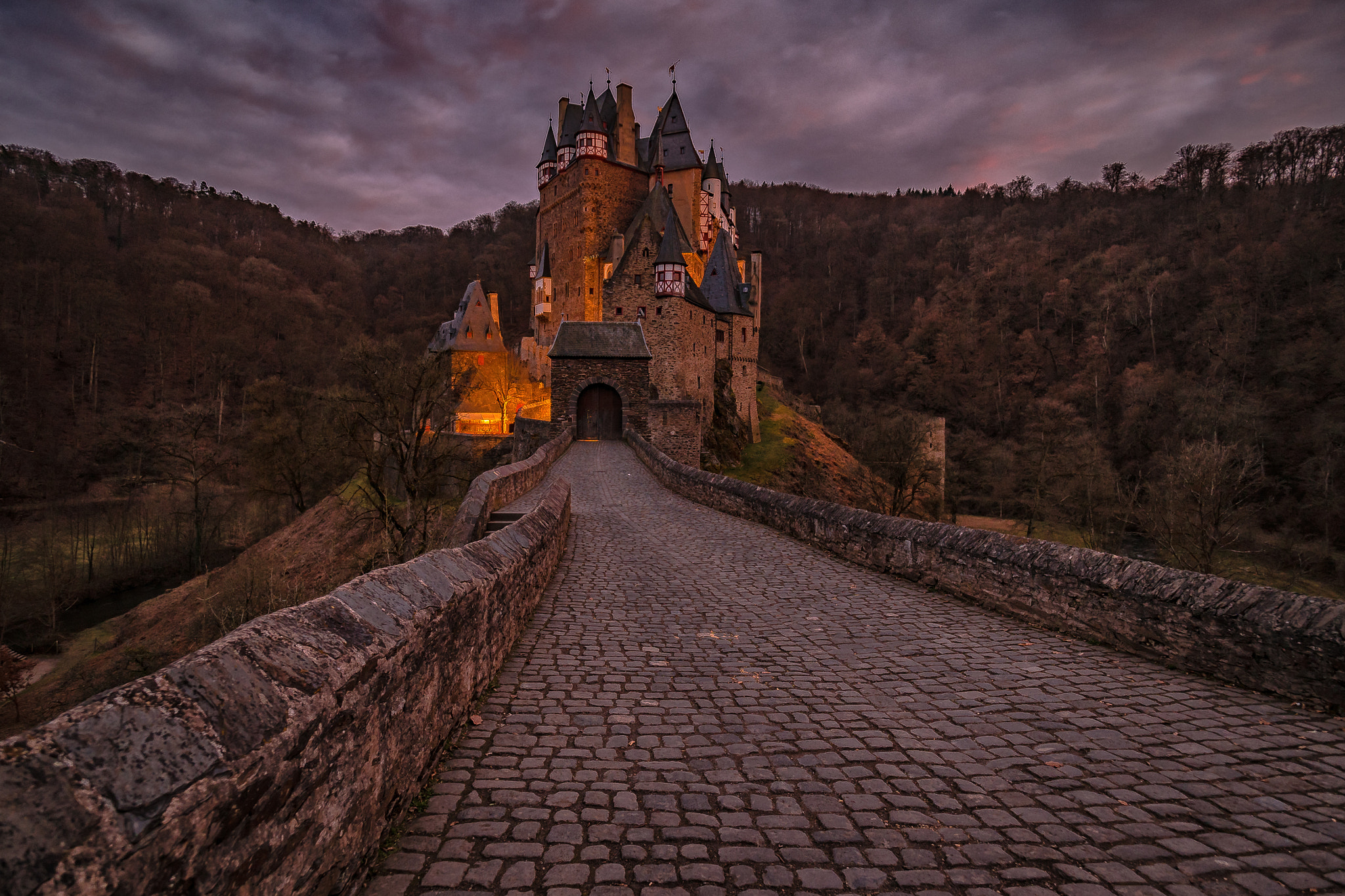 Olympus OM-D E-M5 II + Olympus M.Zuiko Digital ED 7-14mm F2.8 PRO sample photo. Eltz castle at dusk photography