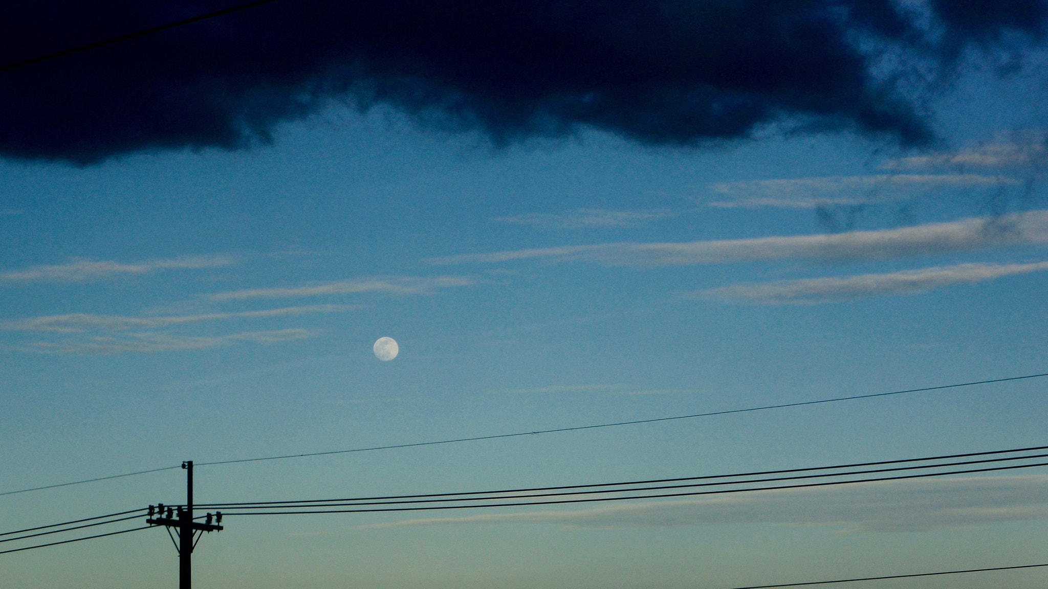 Sony E 18-55mm F3.5-5.6 OSS sample photo. Moon under clouds photography