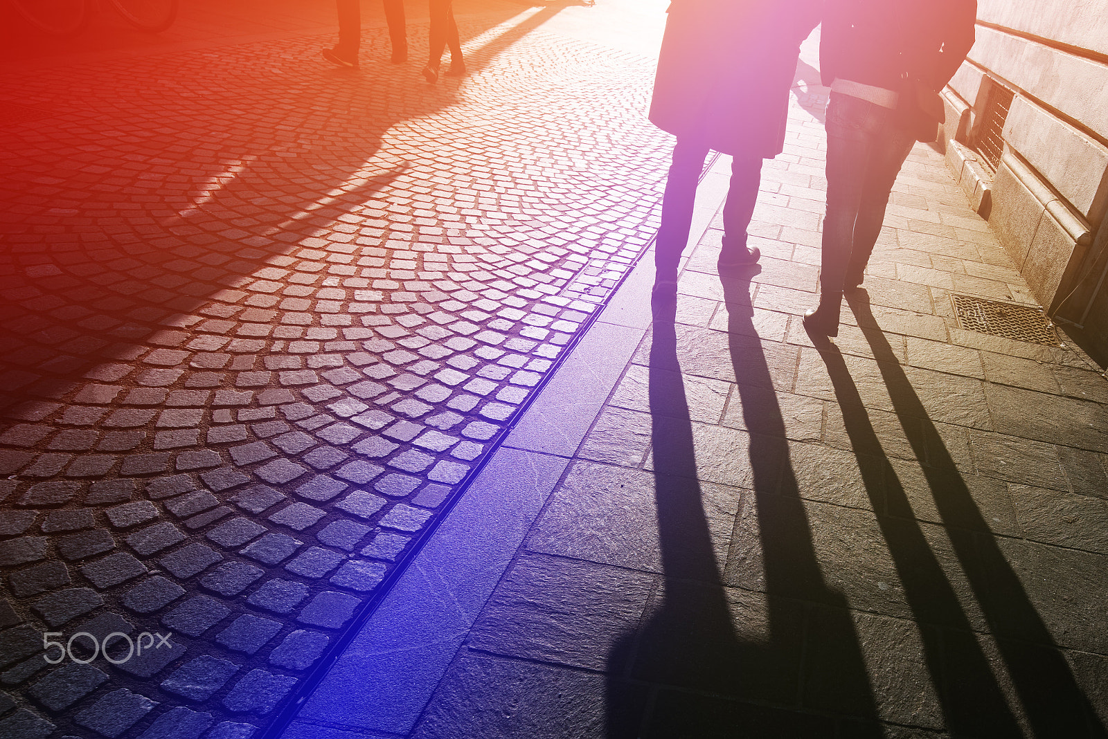 Tamron SP 15-30mm F2.8 Di VC USD sample photo. Long shadows of pedestrian people on the street photography