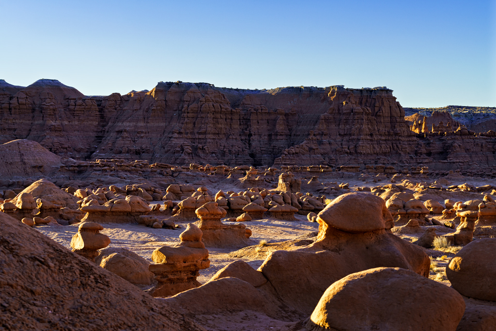 Sony a7R II + Sony FE 70-200mm F4 G OSS sample photo. Goblin valley hoodoos at sunrise photography