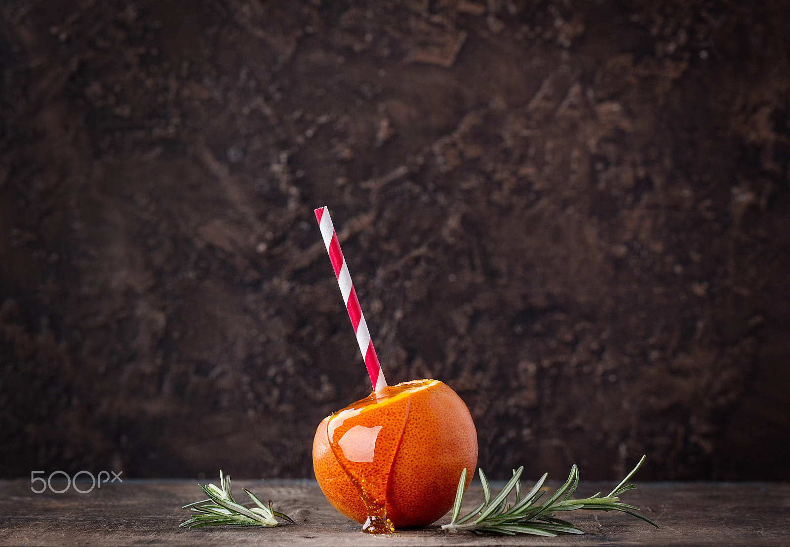 Canon EF 100mm F2.8L Macro IS USM sample photo. Half blood orange with a straw photography
