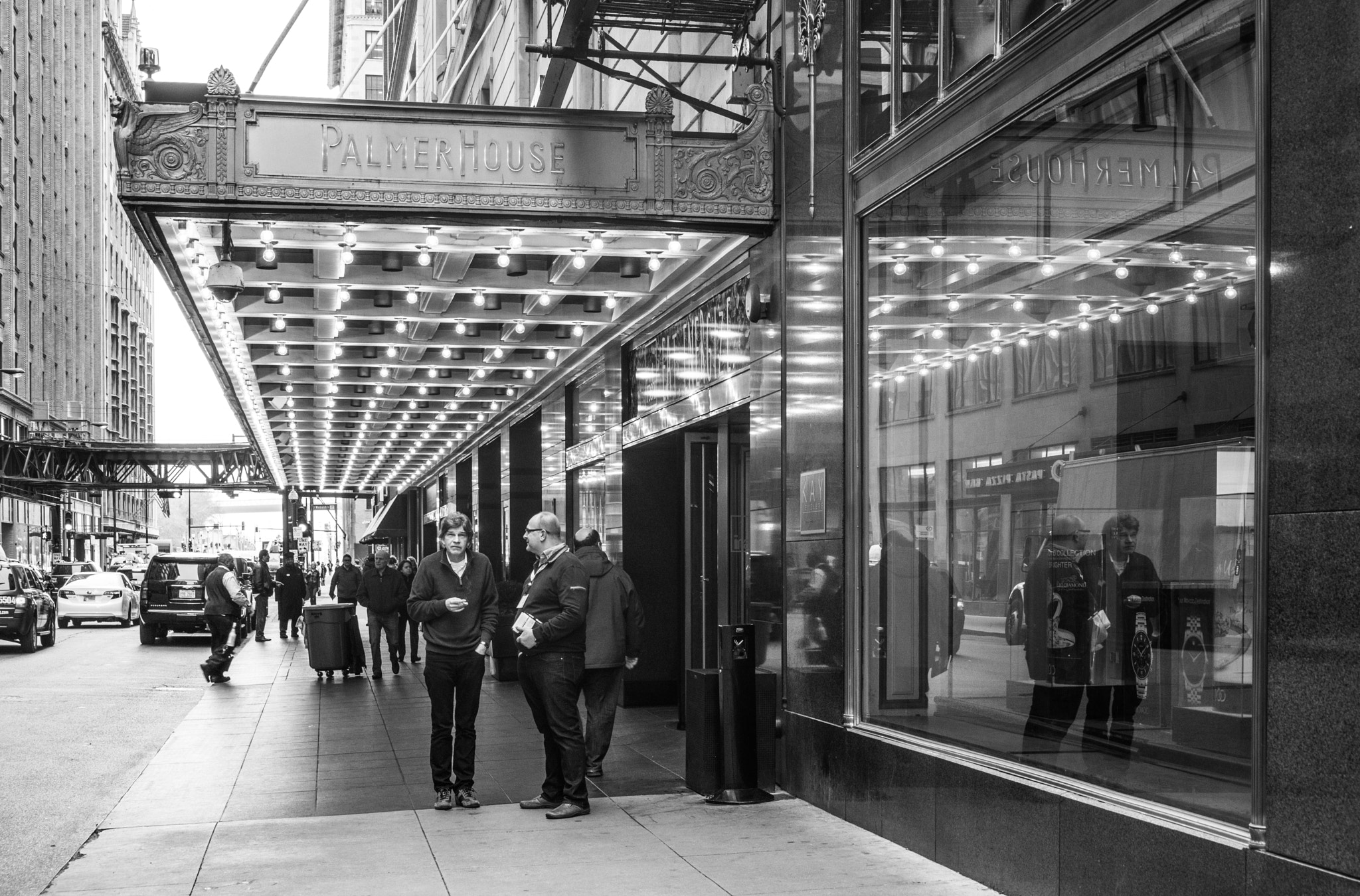 Sony a7R + Sony FE 24-240mm F3.5-6.3 OSS sample photo. Smoking outside palmer house photography