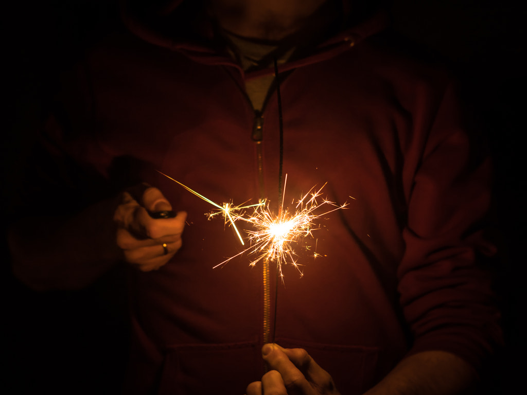 Sparkler in hands by Vladimir Zhdanov on 500px.com