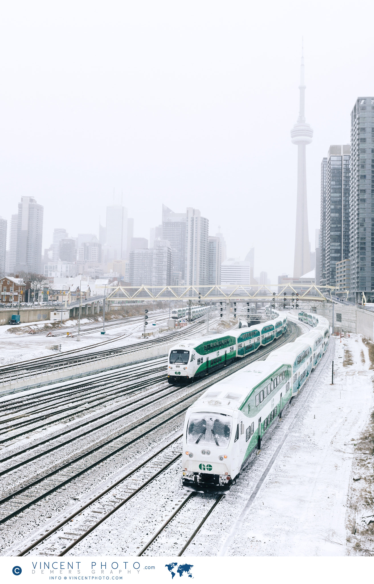 Canon EOS 5D Mark II sample photo. Trains in downtown toronto on a snowy day. photography
