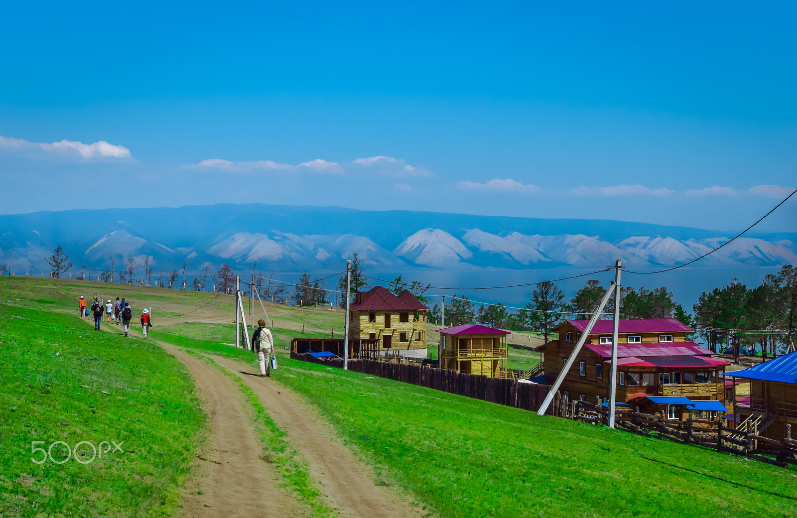Sigma 28-300mm F3.5-6.3 DG Macro sample photo. Blue sky and green field photography