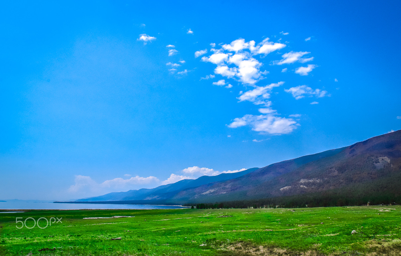 Nikon D5300 + Sigma 28-300mm F3.5-6.3 DG Macro sample photo. Baikal lake, blue sky and green mountains photography
