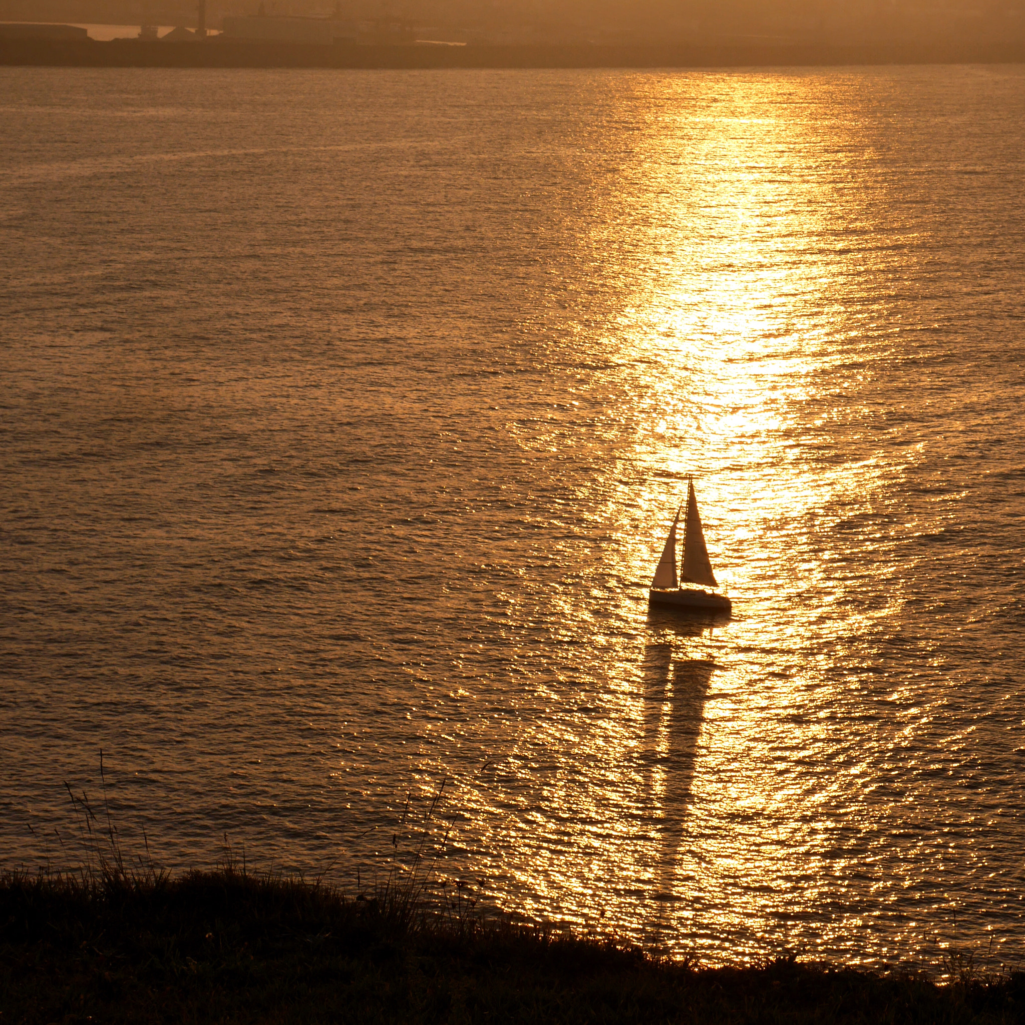Panasonic Lumix DMC-GX7 sample photo. A boat in the sea photography