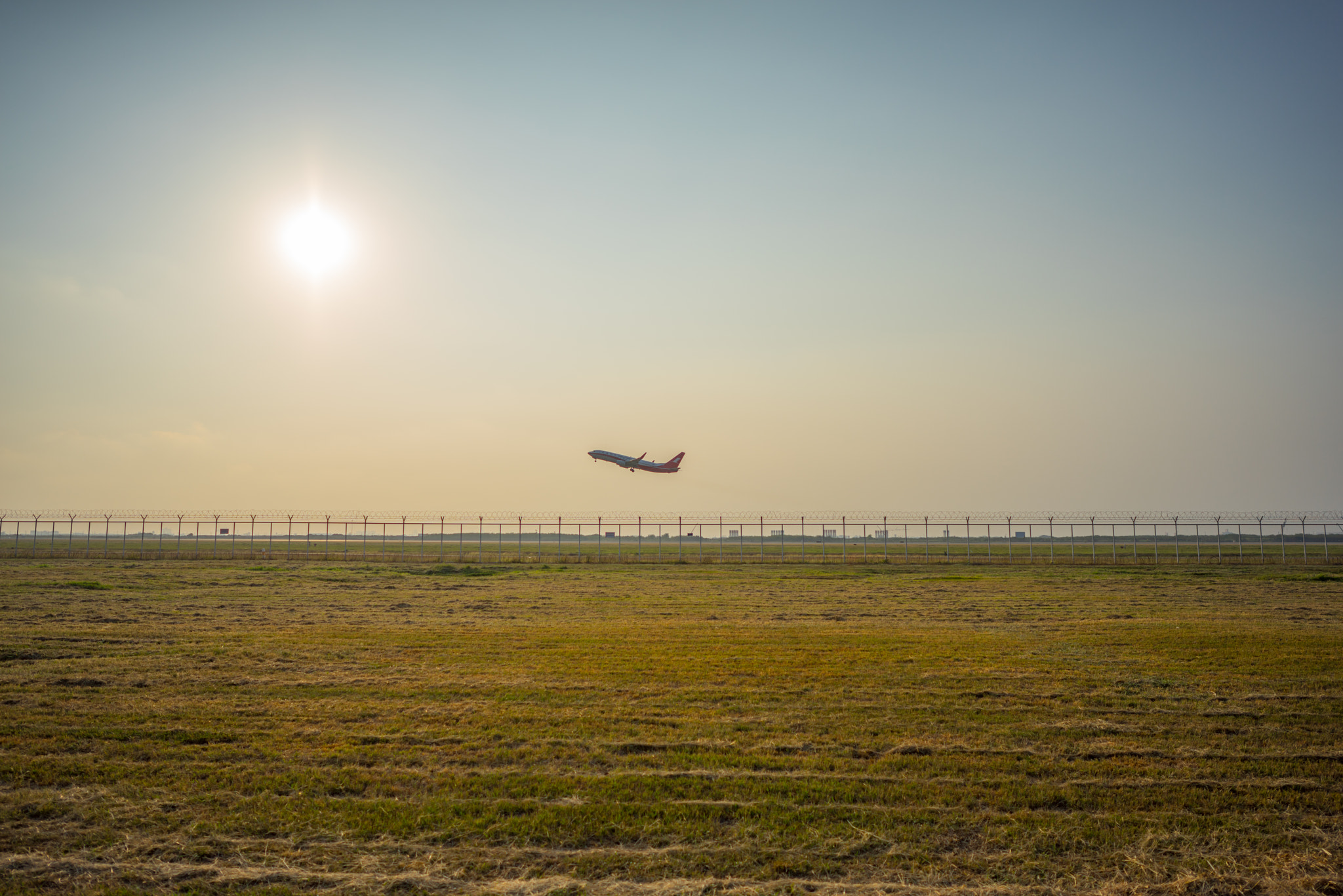 Sony a7R sample photo. Taking off on a sunny day photography