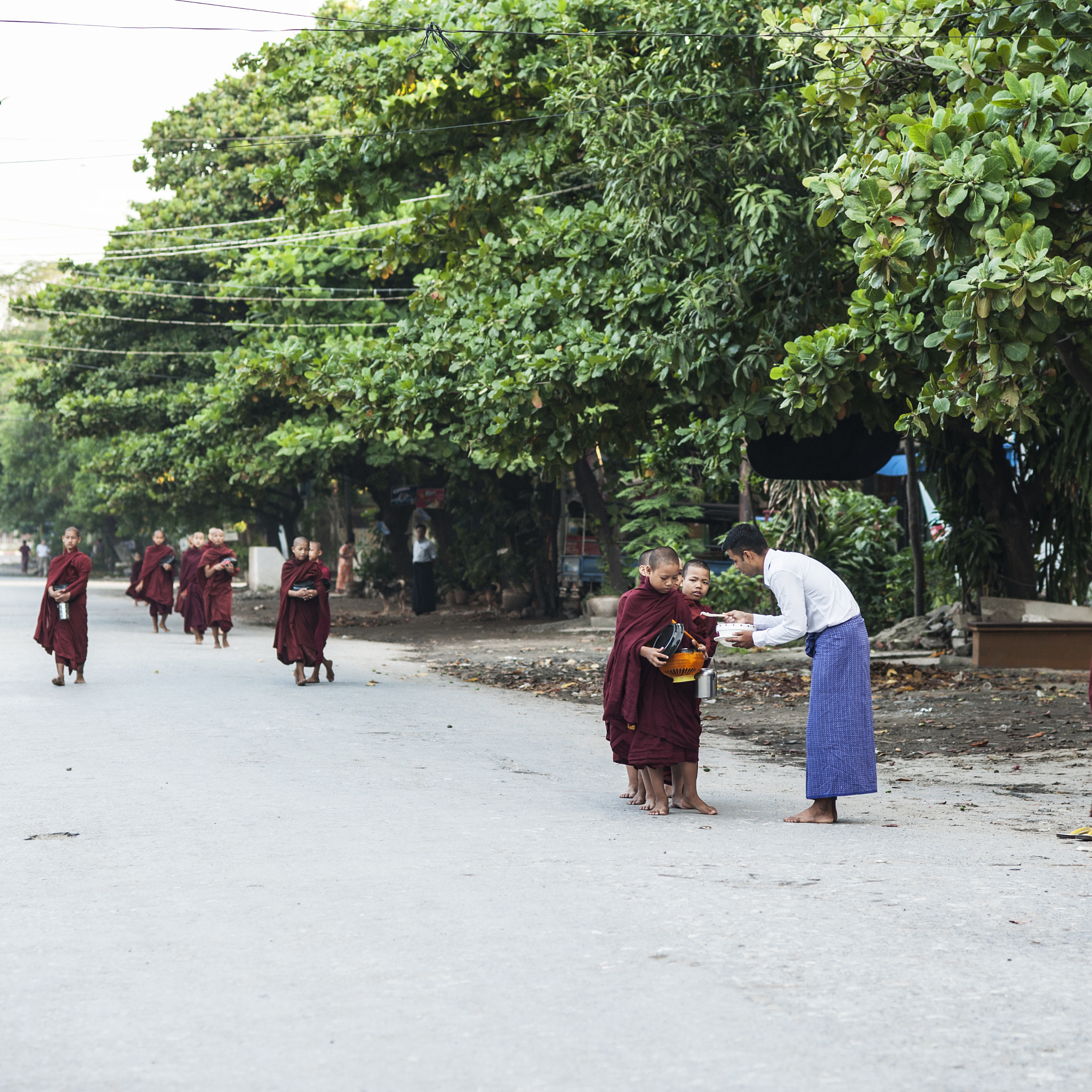 Nikon D700 + Nikon AF Nikkor 85mm F1.8D sample photo. Donation in myanmar photography
