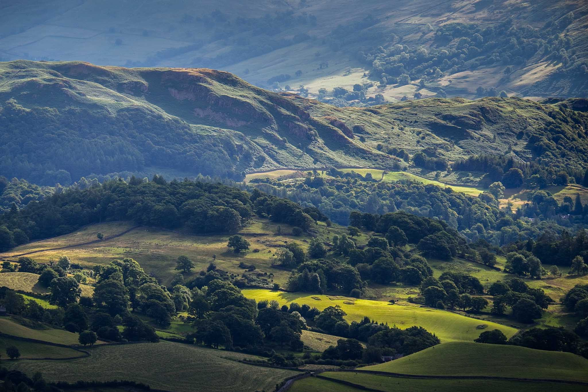 Fujifilm X-T1 + Fujifilm XF 55-200mm F3.5-4.8 R LM OIS sample photo. Morning sun on feilds and fells photography