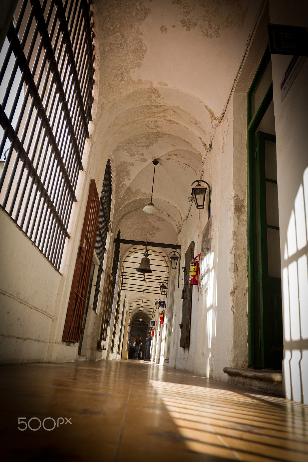 Canon EOS 7D + Canon EF 16-35mm F2.8L II USM sample photo. Low angle view of a corridor with vaulted roof photography