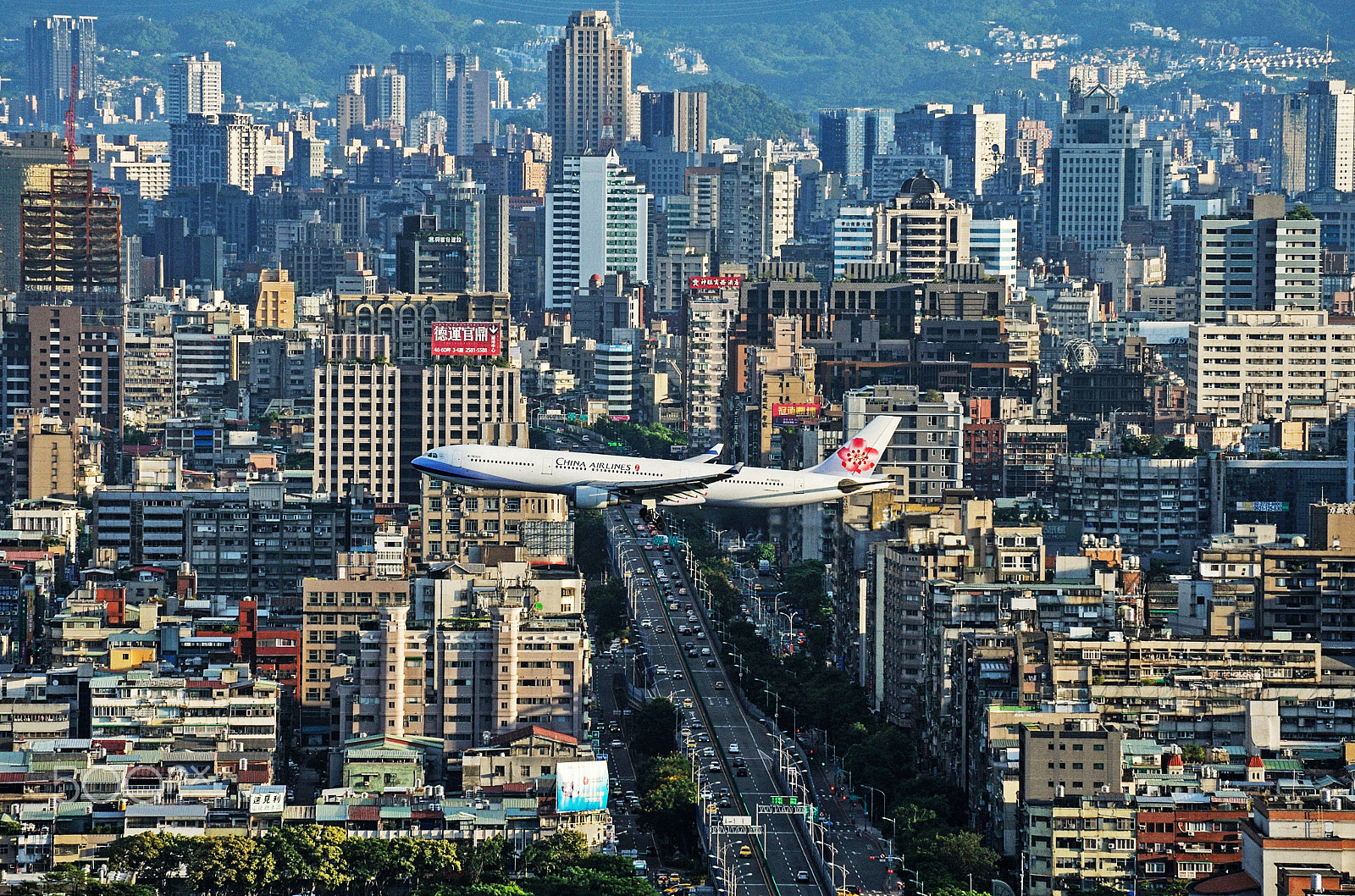 Nikon D700 + Nikon AF-S Nikkor 70-300mm F4.5-5.6G VR sample photo. Plane over taipei city photography