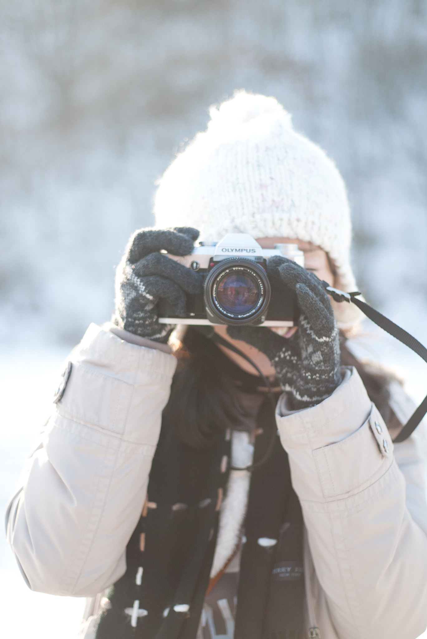 Canon EOS-1D + Canon EF 50mm F1.8 II sample photo. A woman is taking a photo photography