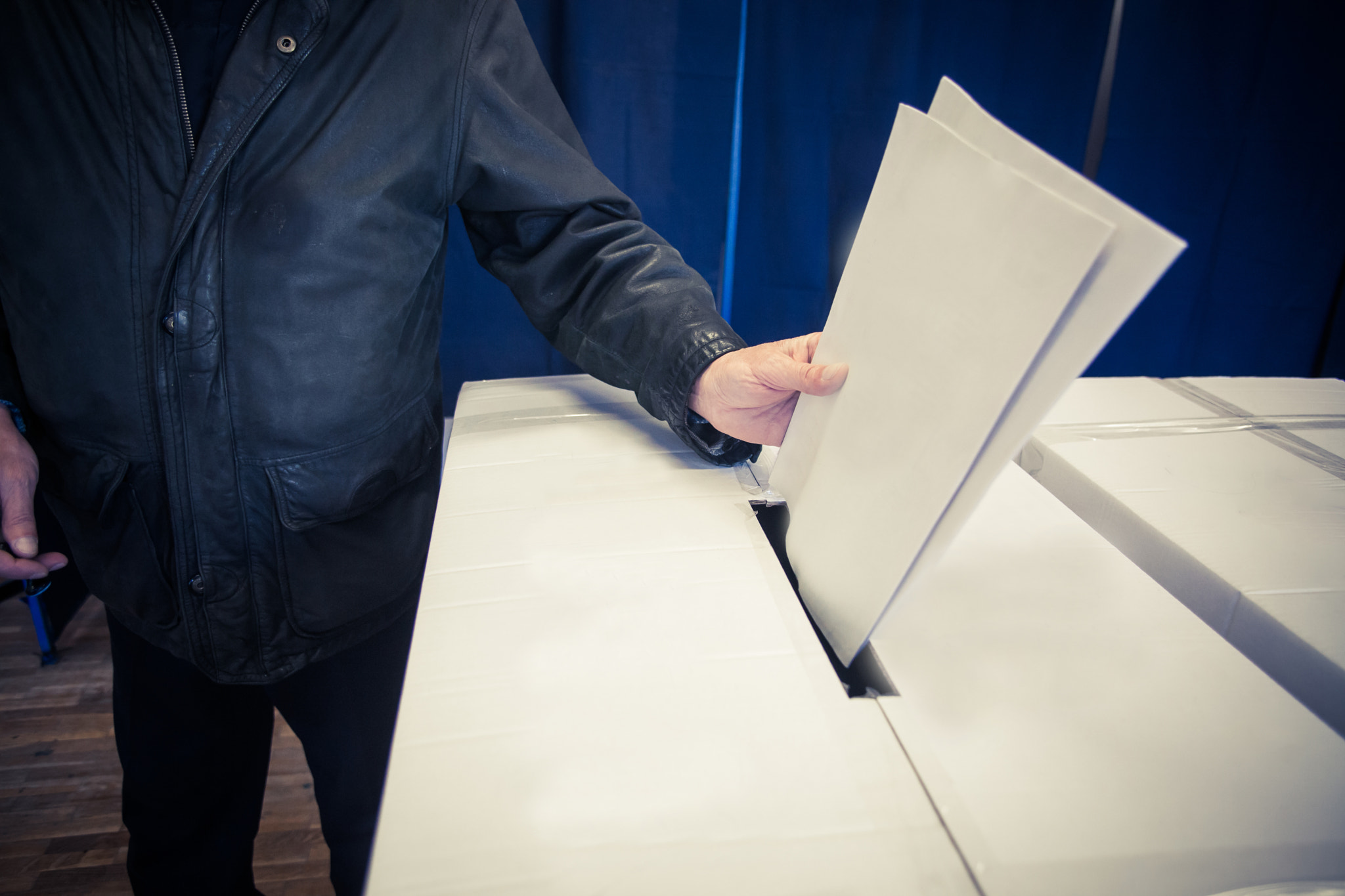 Canon EOS 5D Mark II sample photo. Person voting at polling station photography