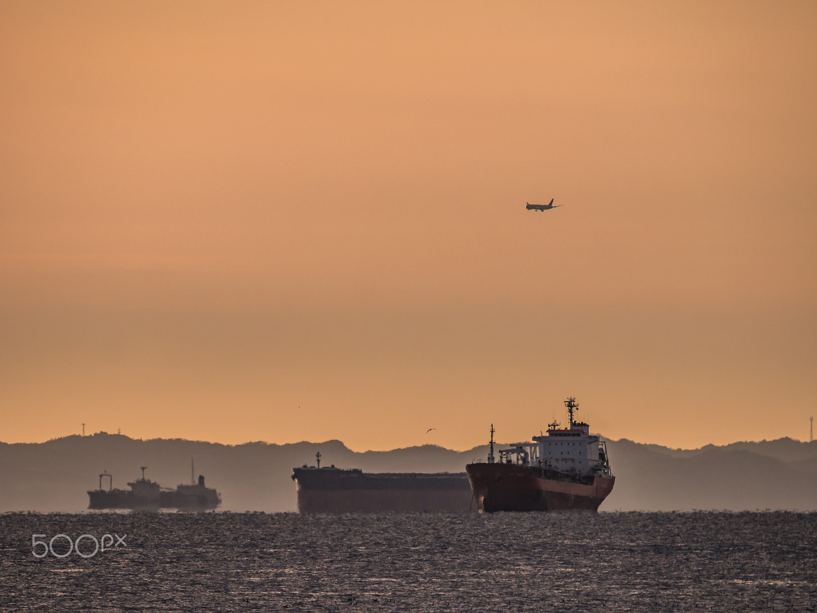 Panasonic Lumix DMC-G7 sample photo. A ship that will anchor and landing airplane , ngo photography