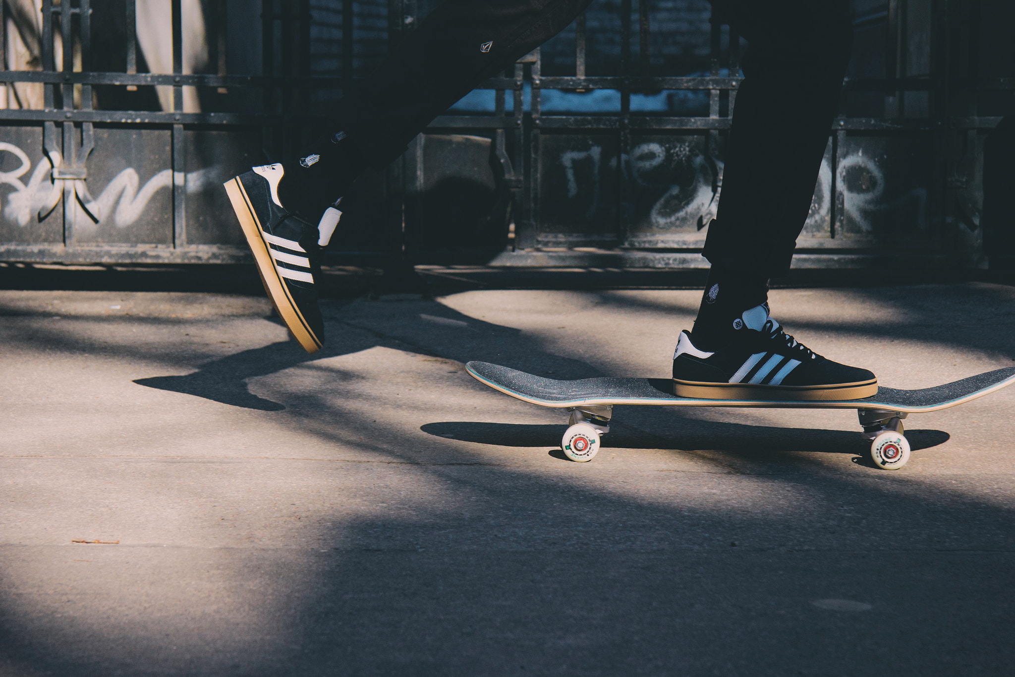 Canon EF-S 17-85mm F4-5.6 IS USM sample photo. Skateboarder in riga streets photography