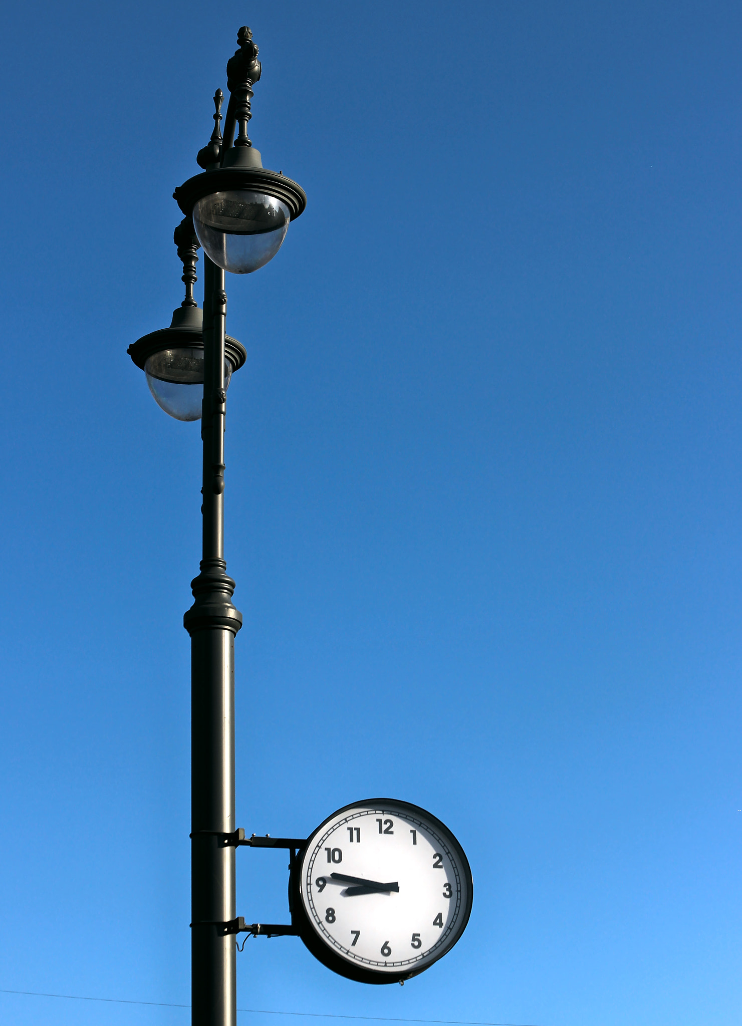 Canon EF 28-135mm F3.5-5.6 IS USM sample photo. Morning clocks photography