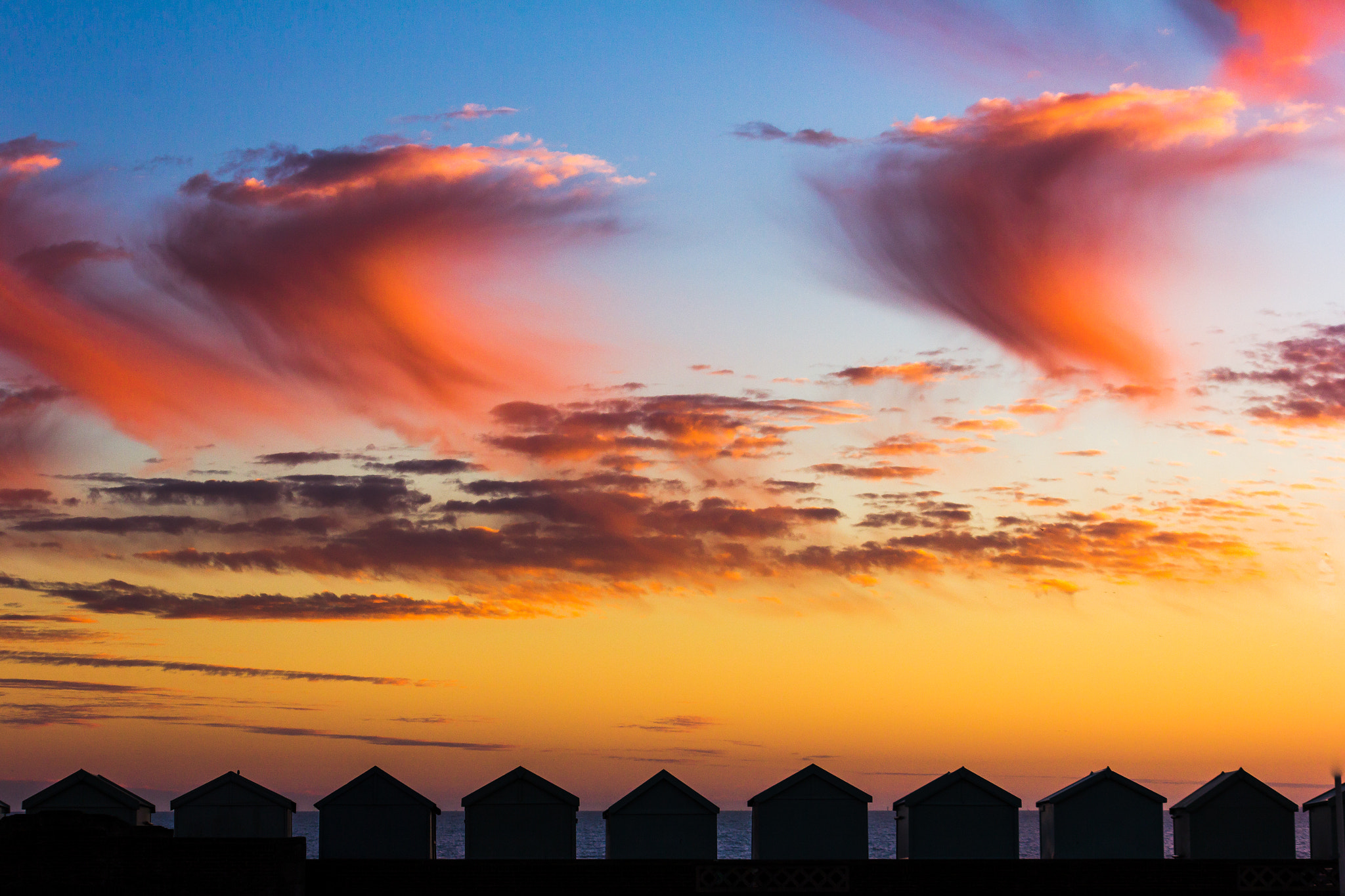Canon EF-S 55-250mm F4-5.6 IS sample photo. Goodnight, beach huts photography
