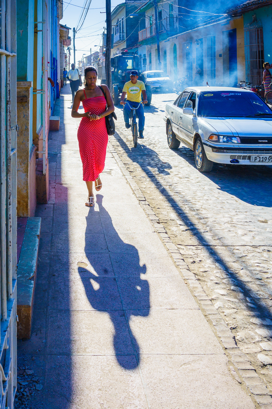Sony a7 II + Sony Sonnar T* FE 35mm F2.8 ZA sample photo. A woman in red photography
