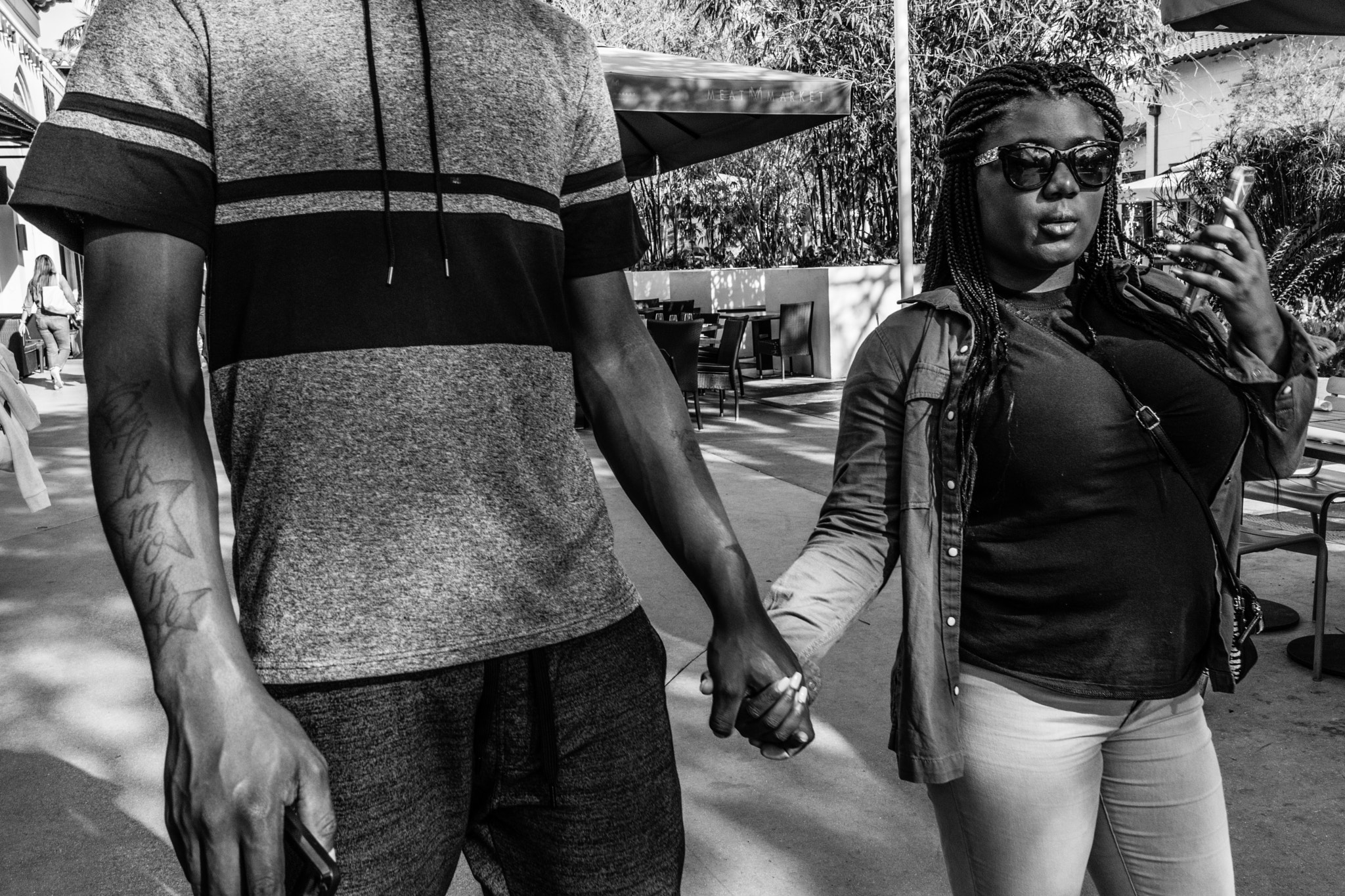 35mm F2.0 sample photo. People of miami - it is  all about perspective... photography