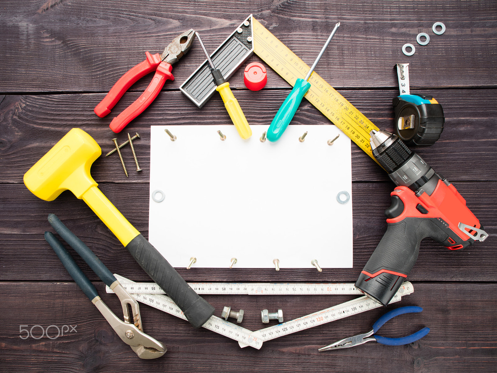 Canon EOS 5DS R + Canon EF 24mm F1.4L II USM sample photo. The tool building on the wooden background around the white shee photography