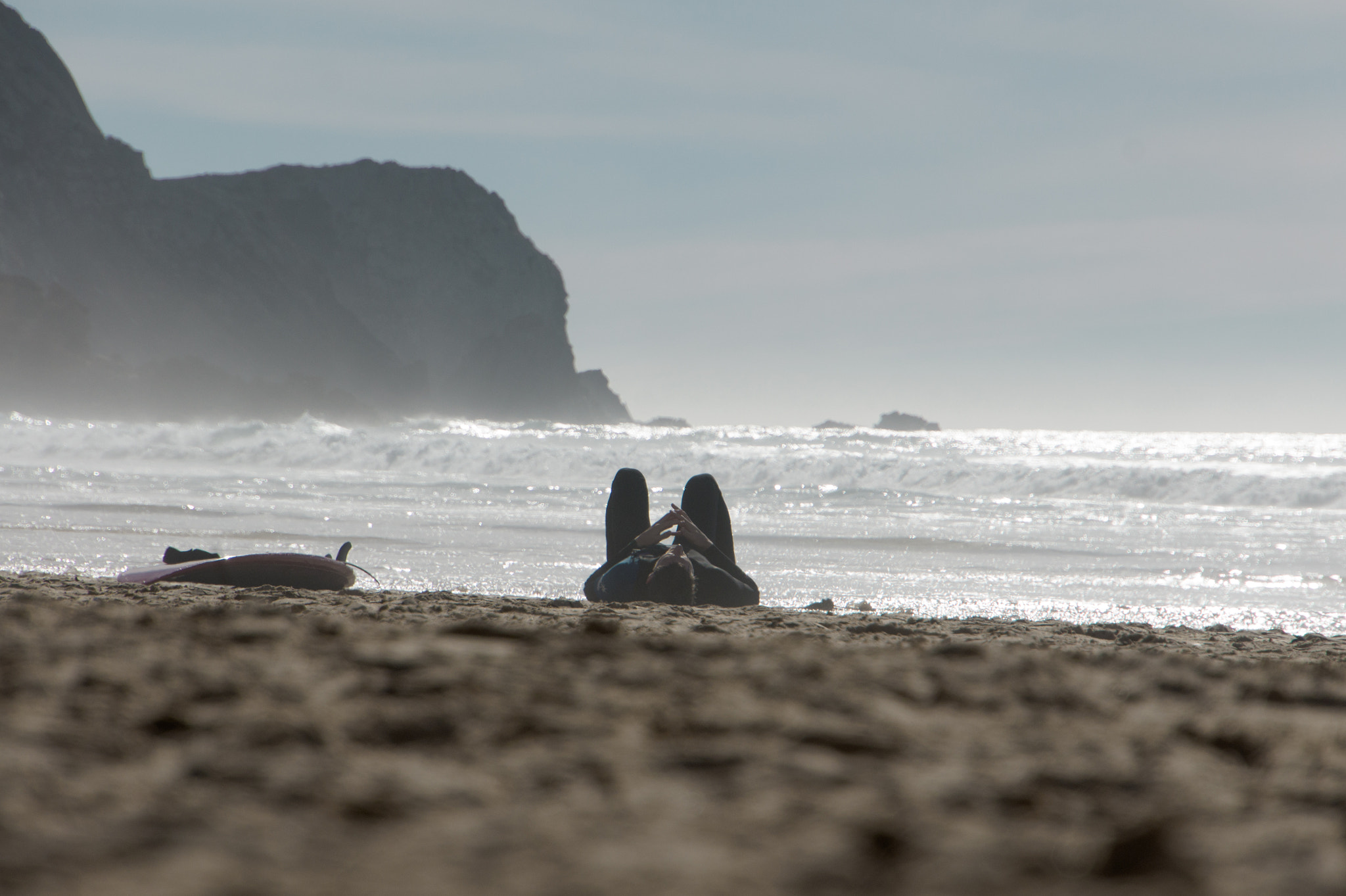 Sony Alpha NEX-5 + Sony E 18-200mm F3.5-6.3 OSS sample photo. Surfer at the beach photography