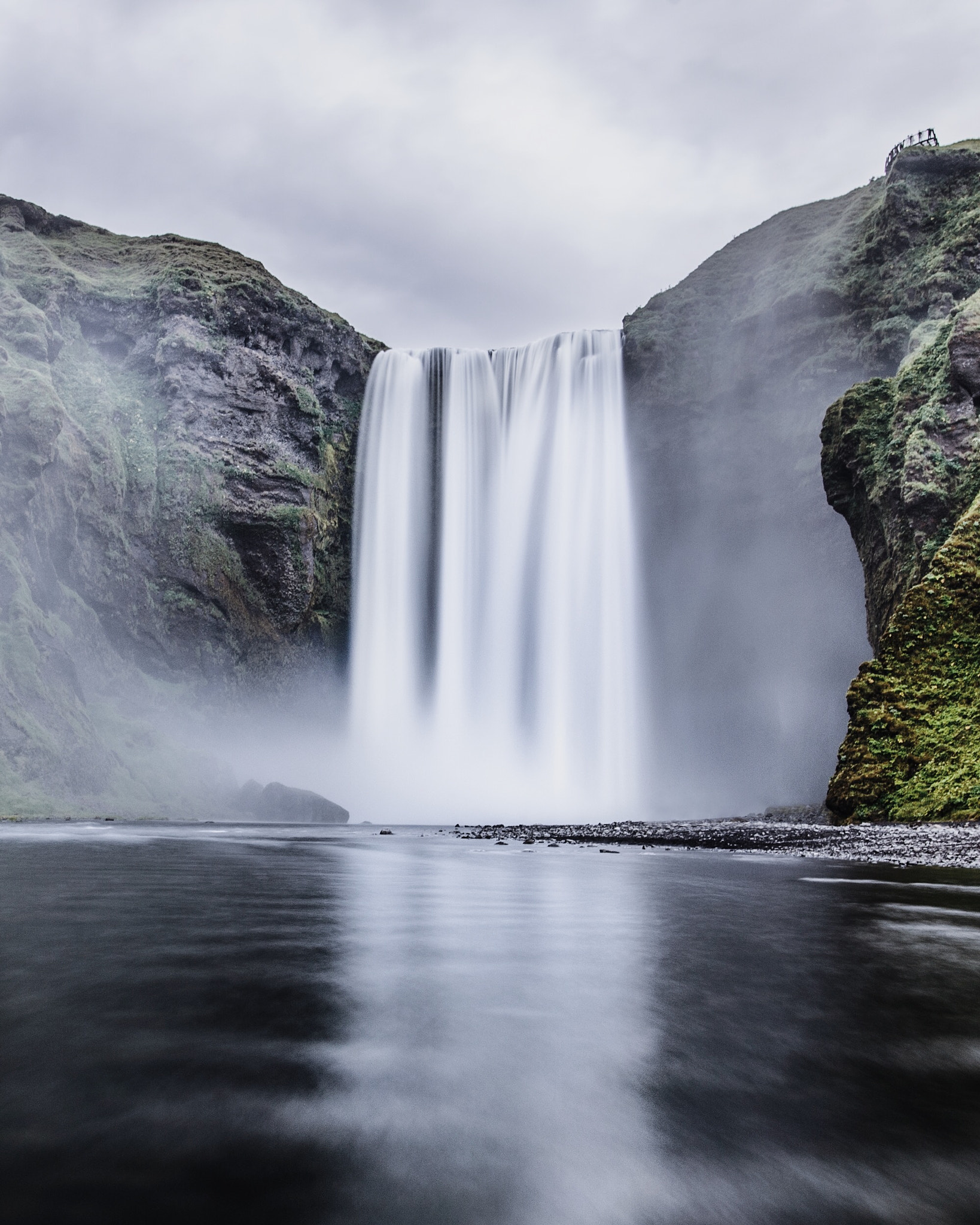 Nikon D4 + Nikon AF-S Nikkor 20mm F1.8G ED sample photo. Skogafoss. iceland. sometimes you just have to stand in glacier water to get the shot. photography